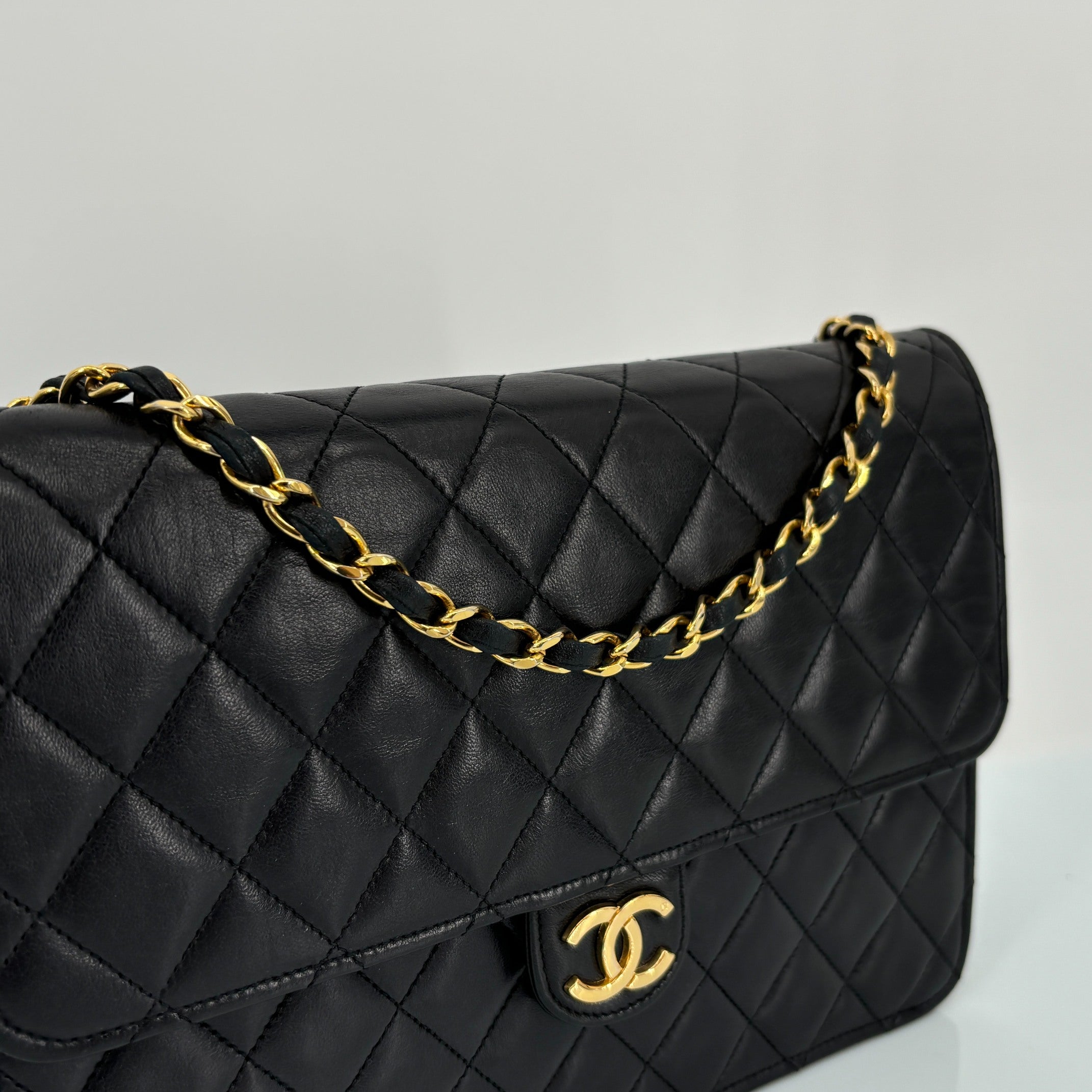 Chanel Single Flap Bag Push-Lock Black Matelassé Leather incl. Dustbag