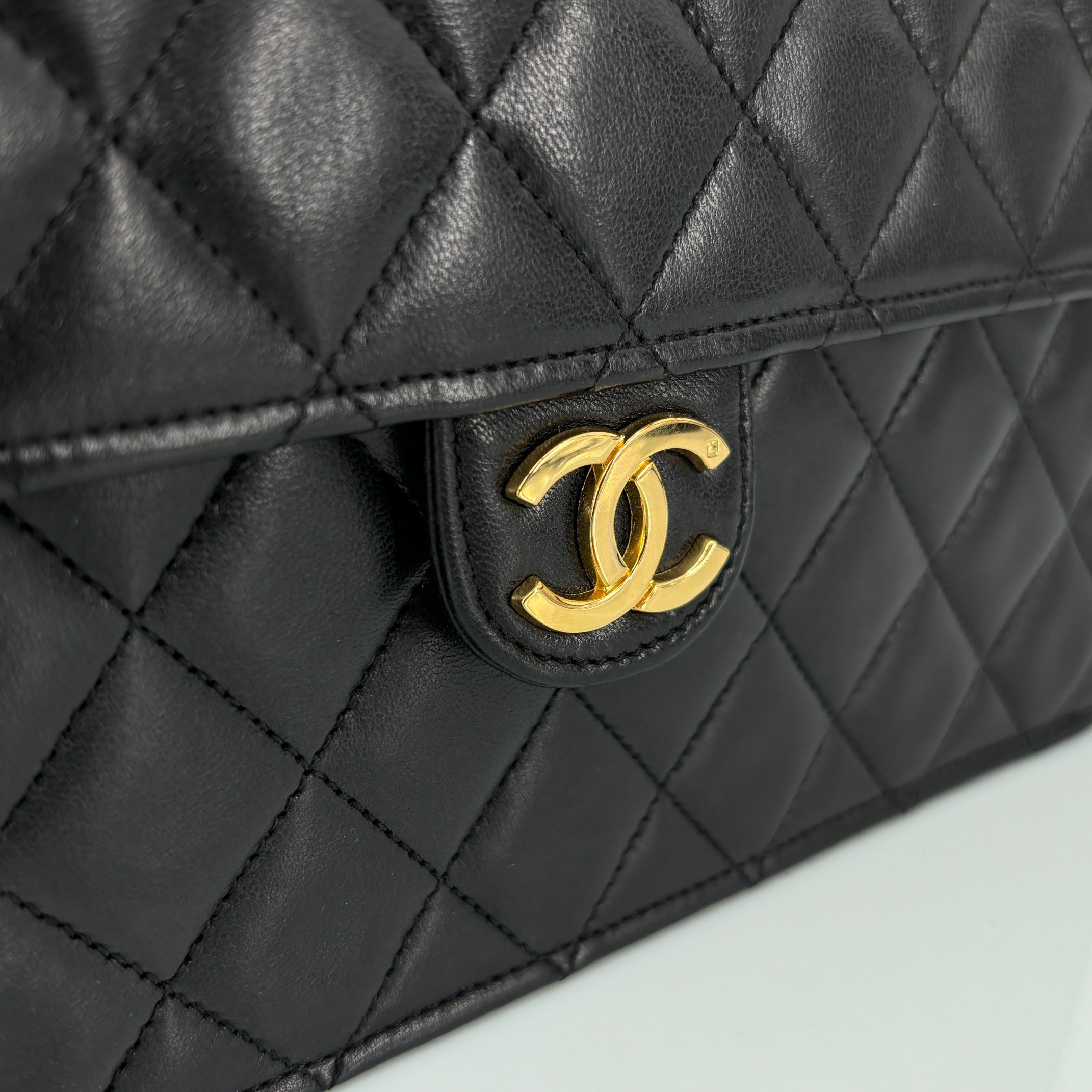 Chanel Single Flap Bag Push-Lock Black Matelassé Leather incl. Dustbag