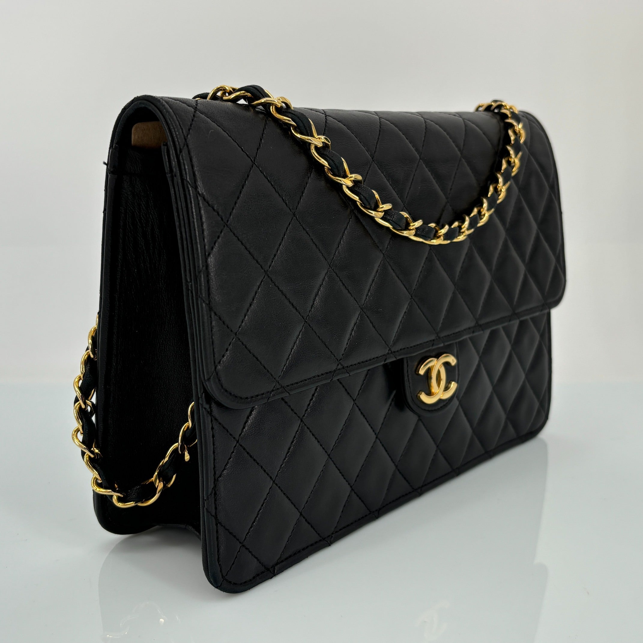 Chanel Single Flap Bag Push-Lock Black Matelassé Leather incl. Dustbag