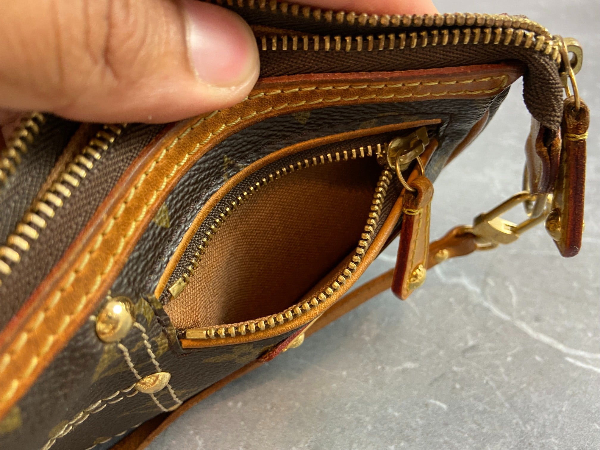 Louis Vuitton Riveting Pochette Accessoires Monogram Canvas