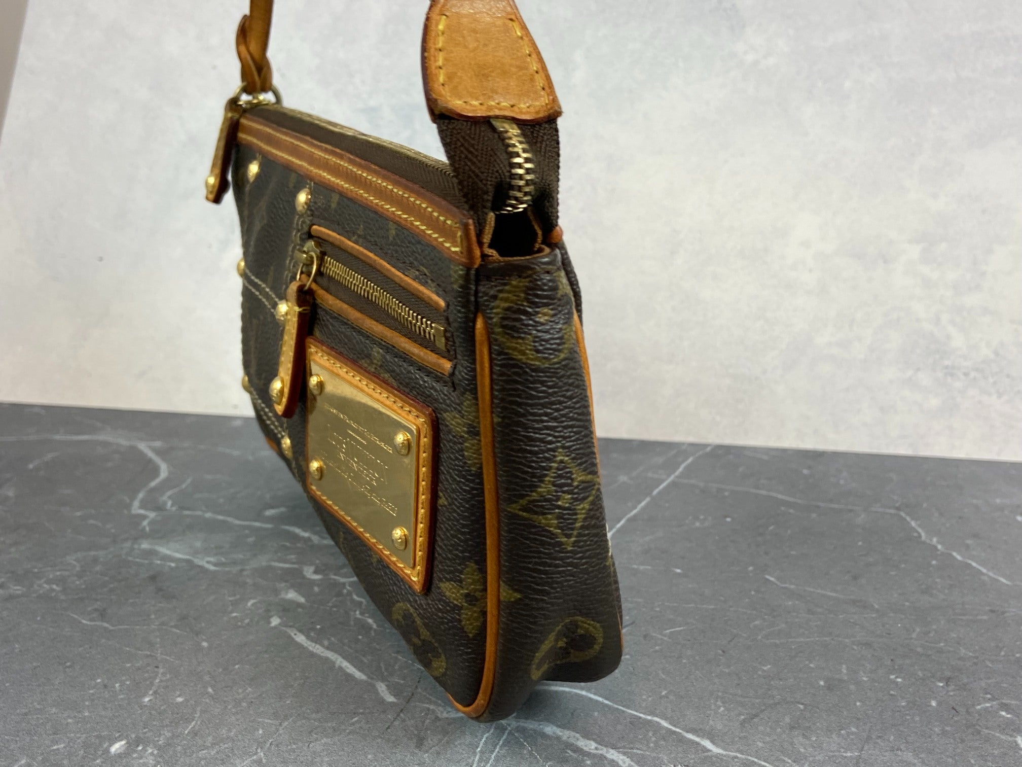 Louis Vuitton Riveting Pochette Accessoires Monogram Canvas