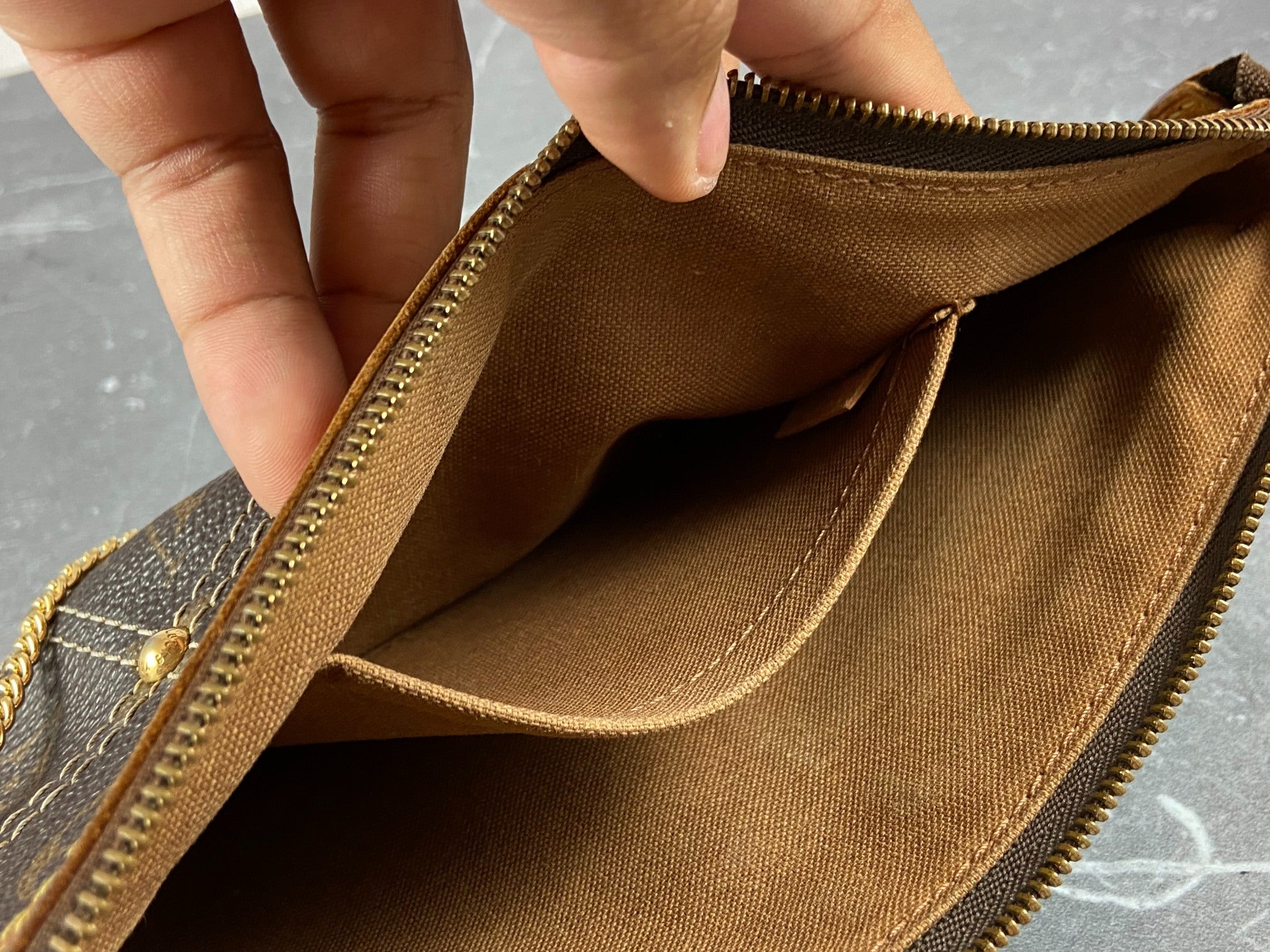 Louis Vuitton Riveting Pochette Accessoires Monogram Canvas