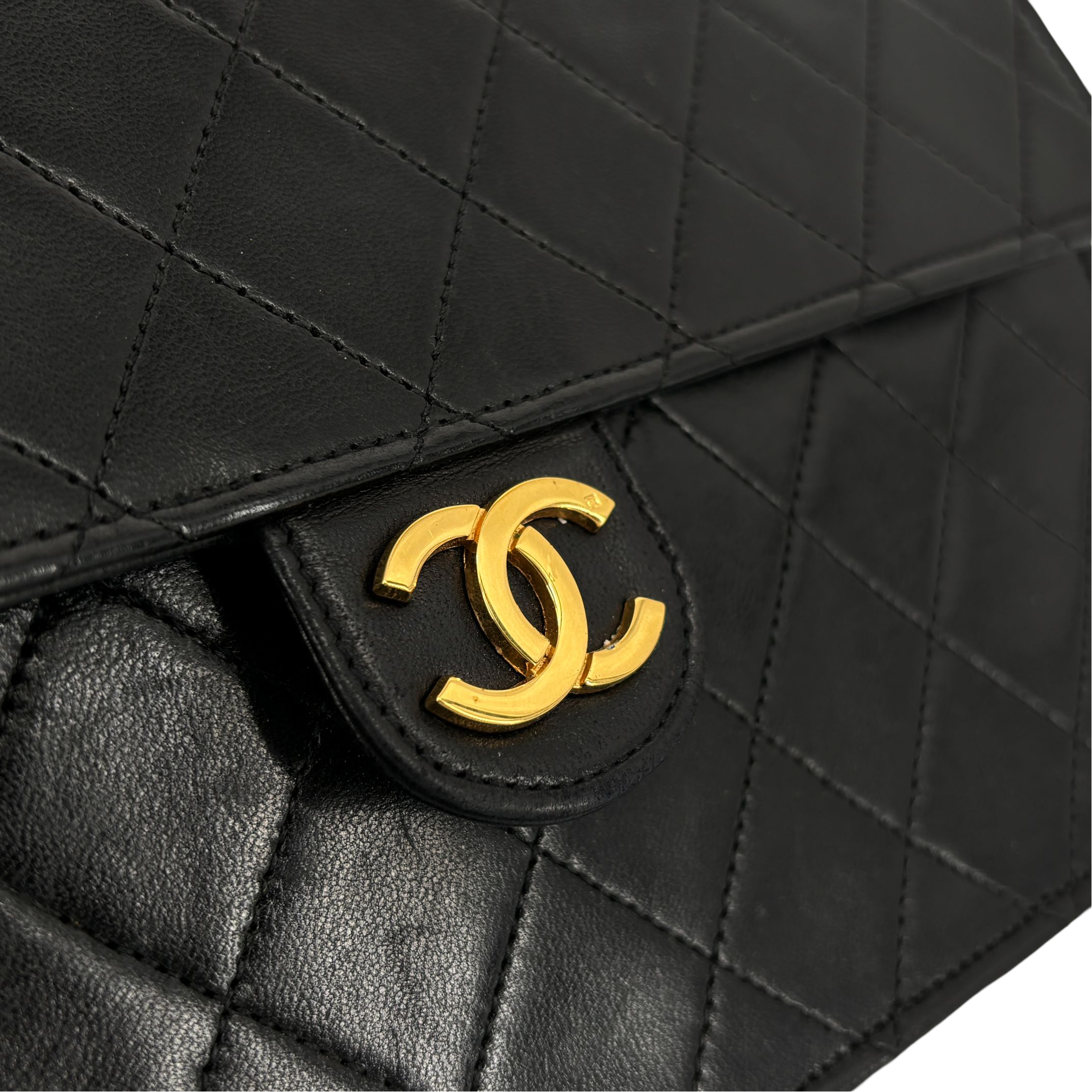 Chanel Single Flap Bag Push-Lock Black Matelassé Leather