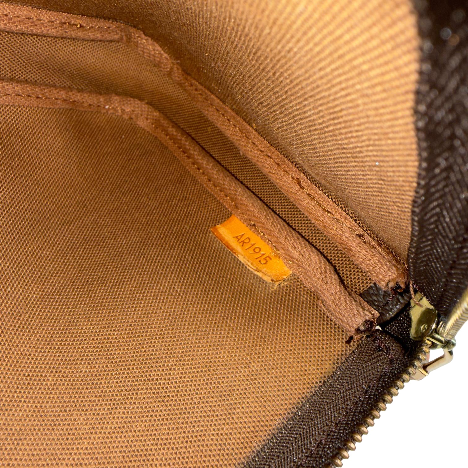 Louis Vuitton Pochette Accessoires Braun Monogram Canvas