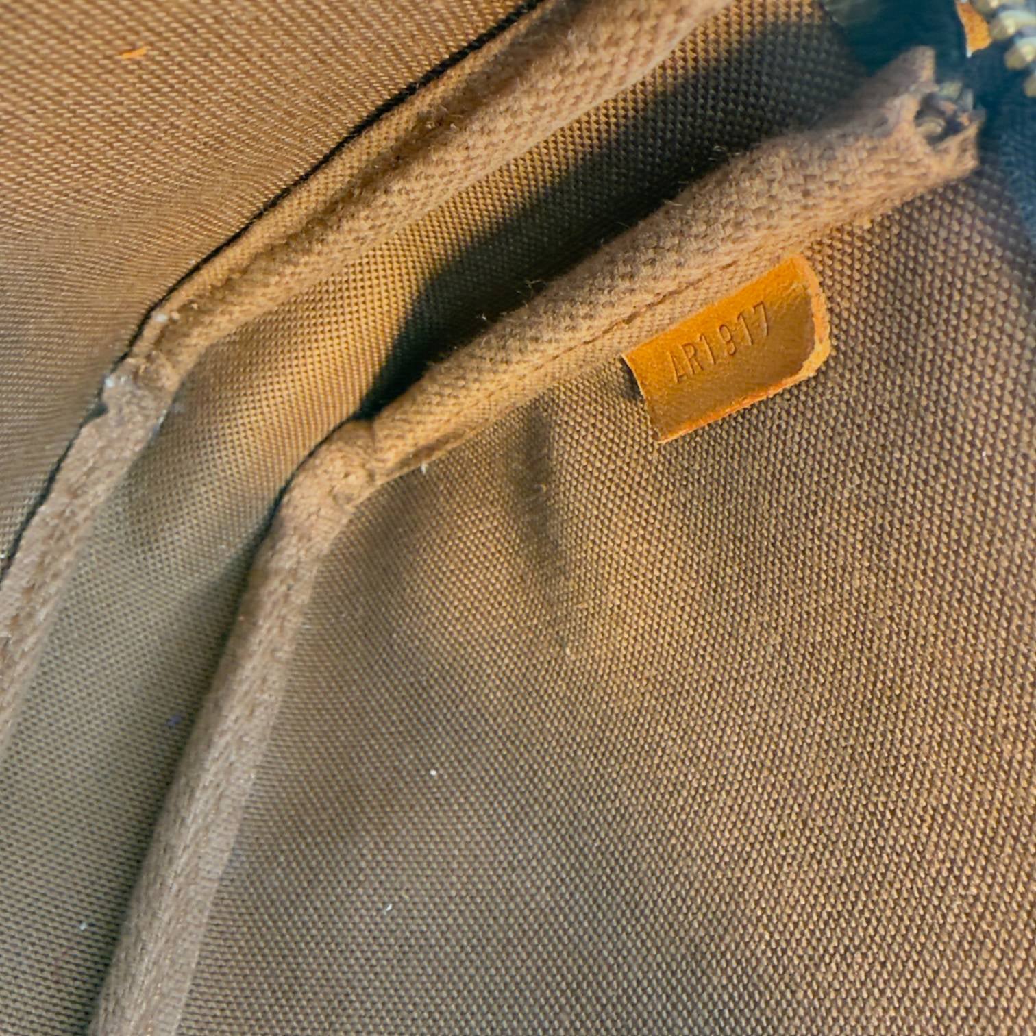 Louis Vuitton Pochette Accessoires Braun Monogram Canvas
