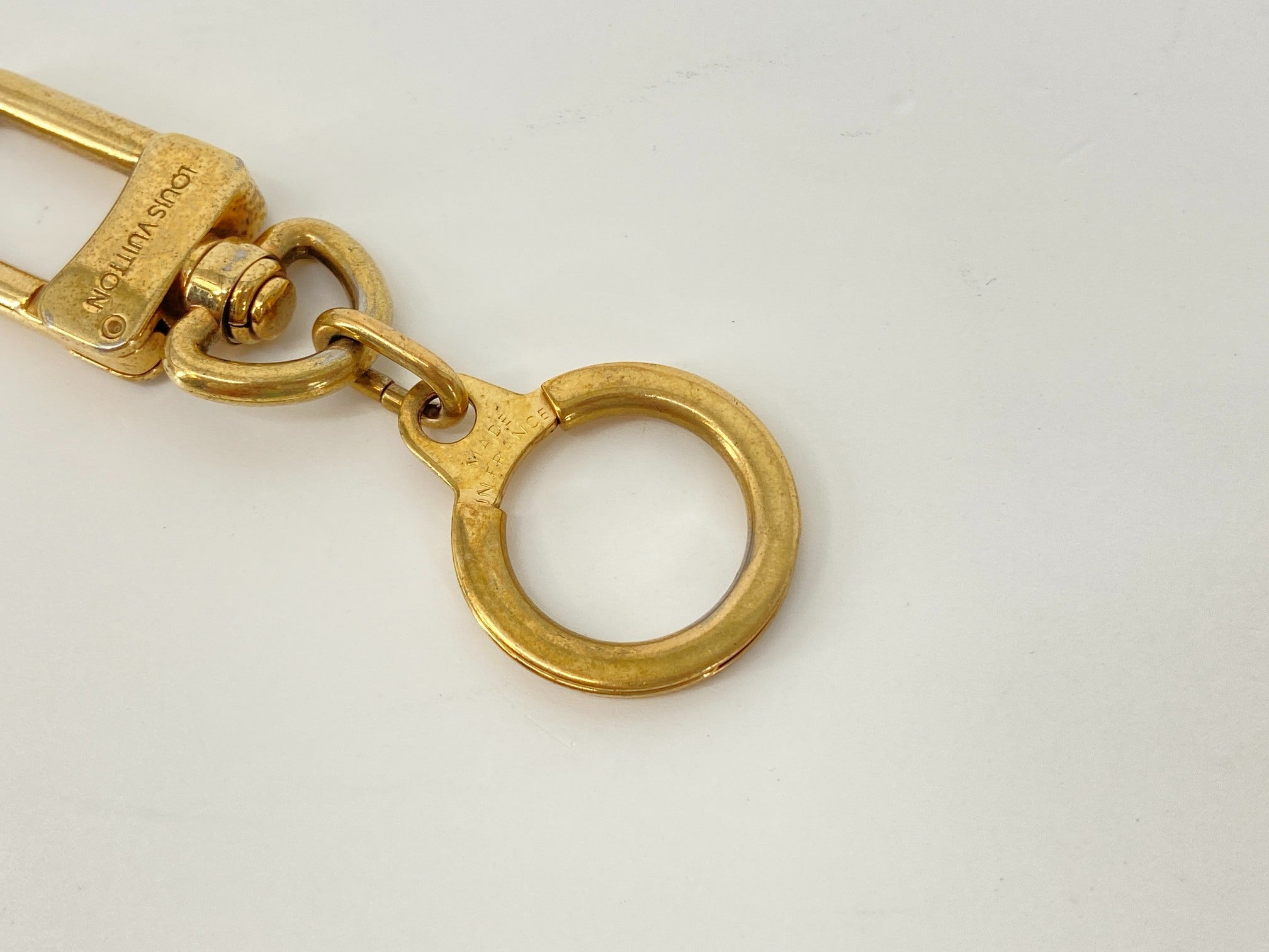 Louis Vuitton Porte Cles Bolt Gold Tone