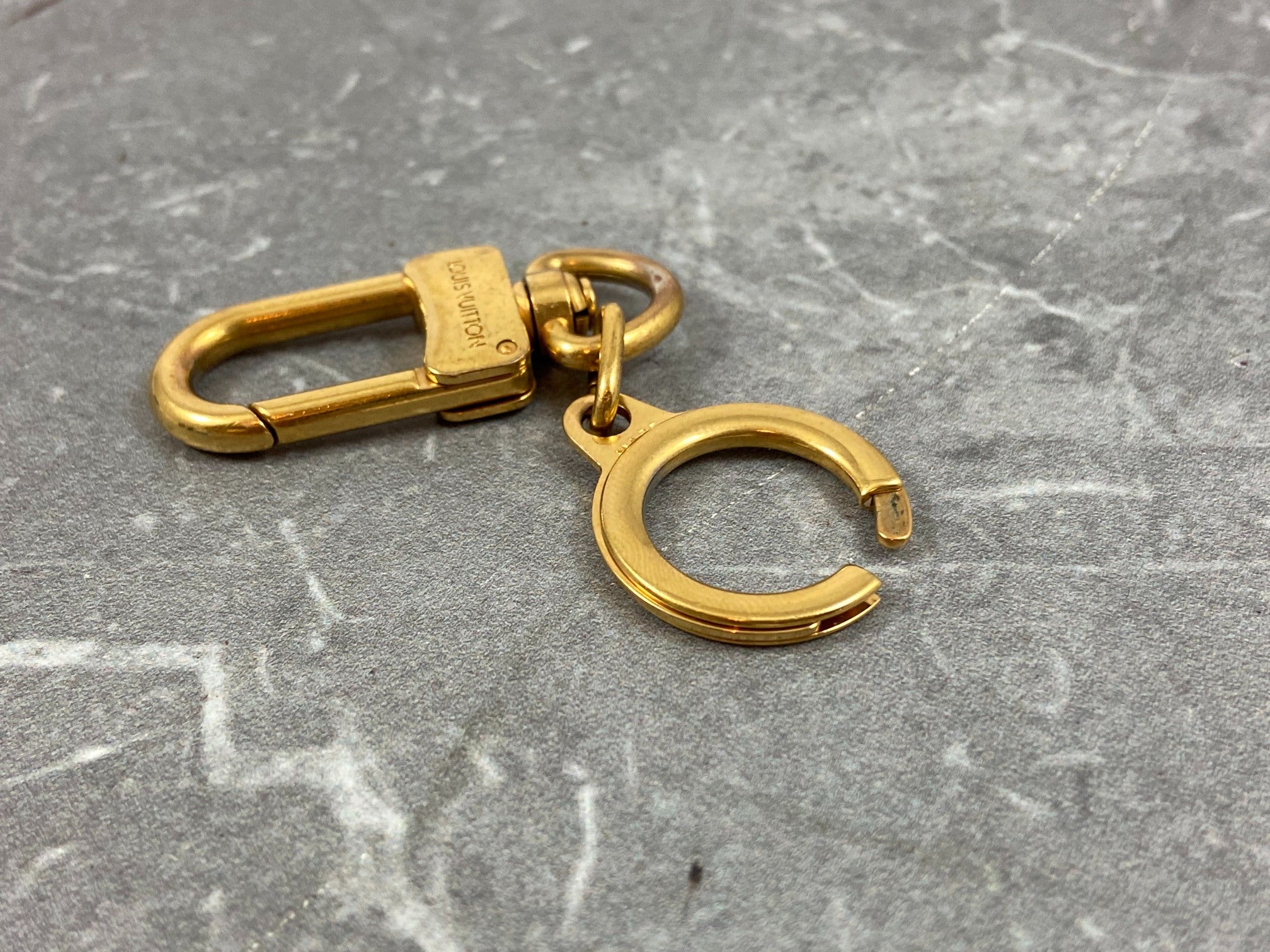 Louis Vuitton Porte Cles Bolt Gold Tone