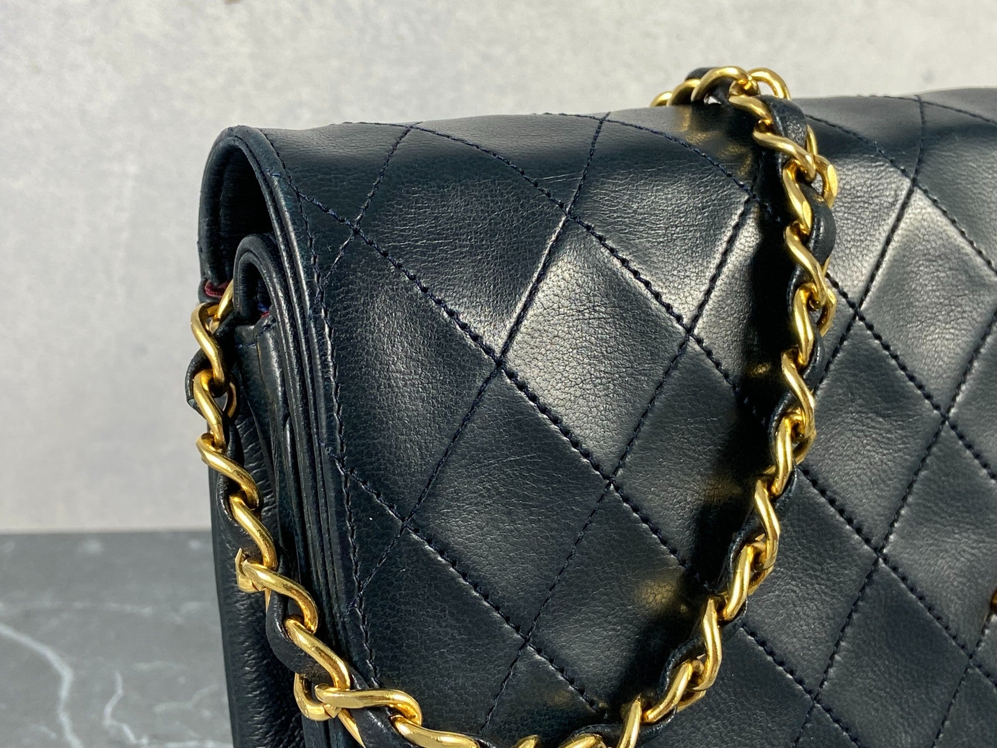 Chanel Matelasse Half-Moon Round Double Flap Bag