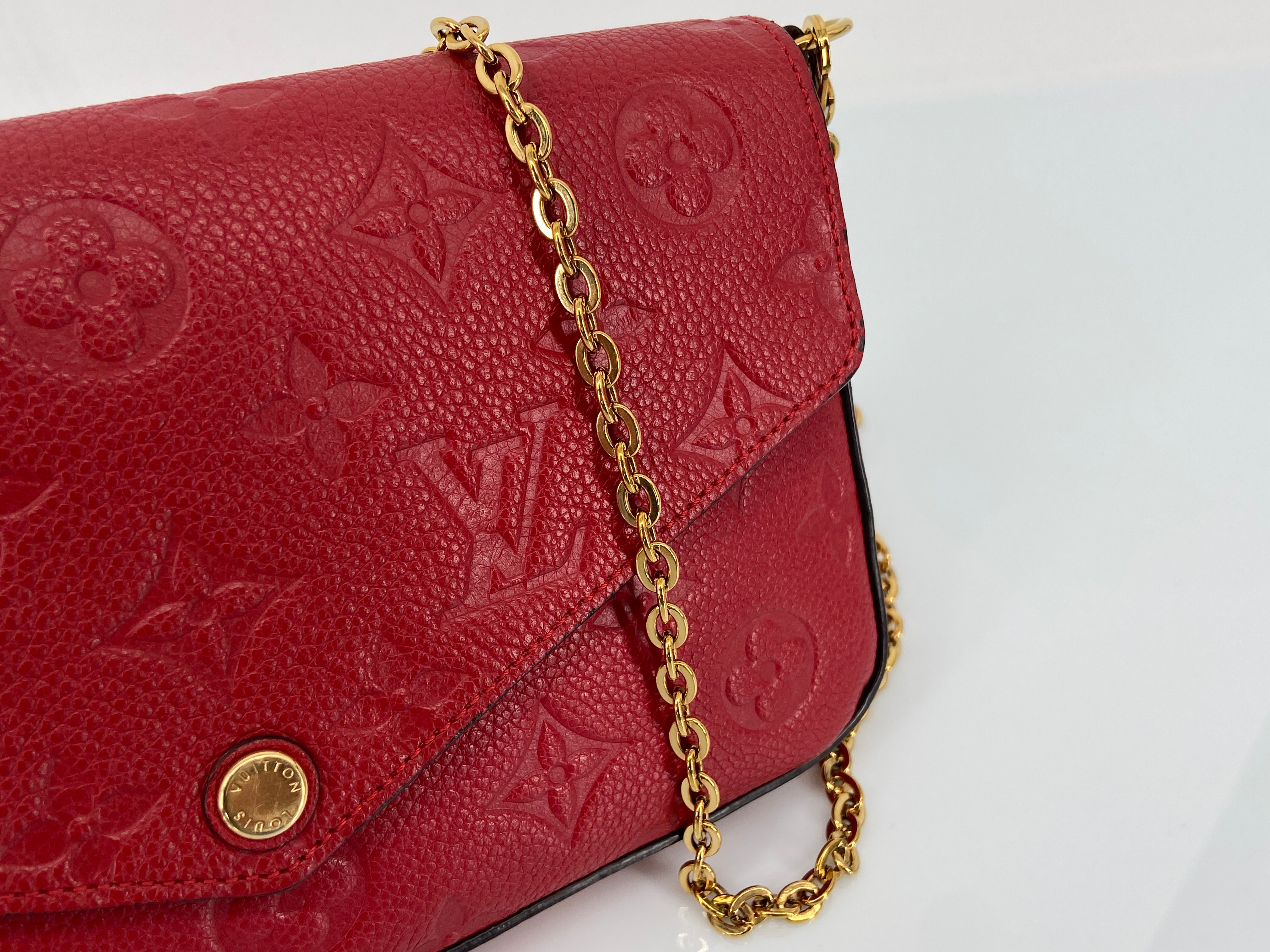 Louis Vuitton Félicie Pochette Red Empreinte Leather incl. Dustbag