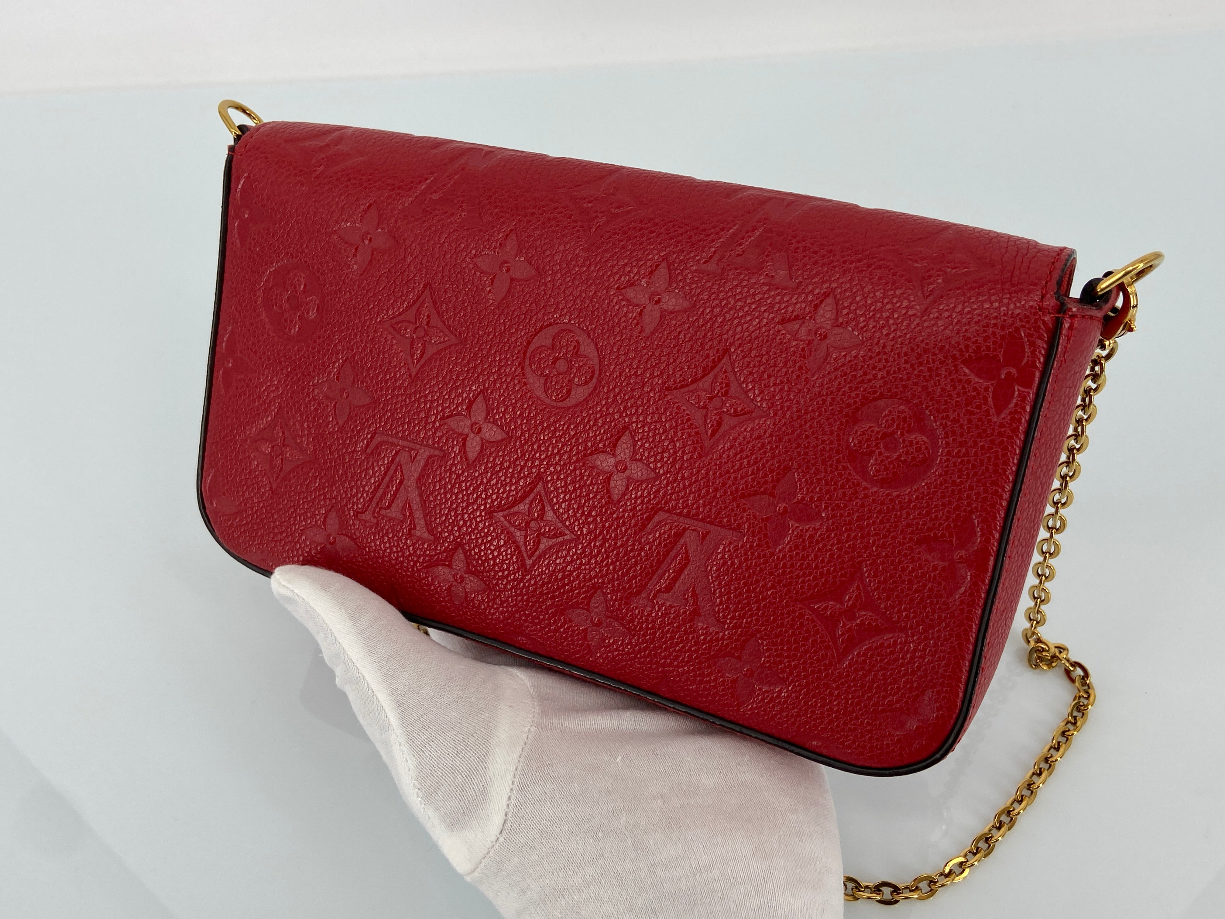 Louis Vuitton Félicie Pochette Red Empreinte Leather incl. Dustbag