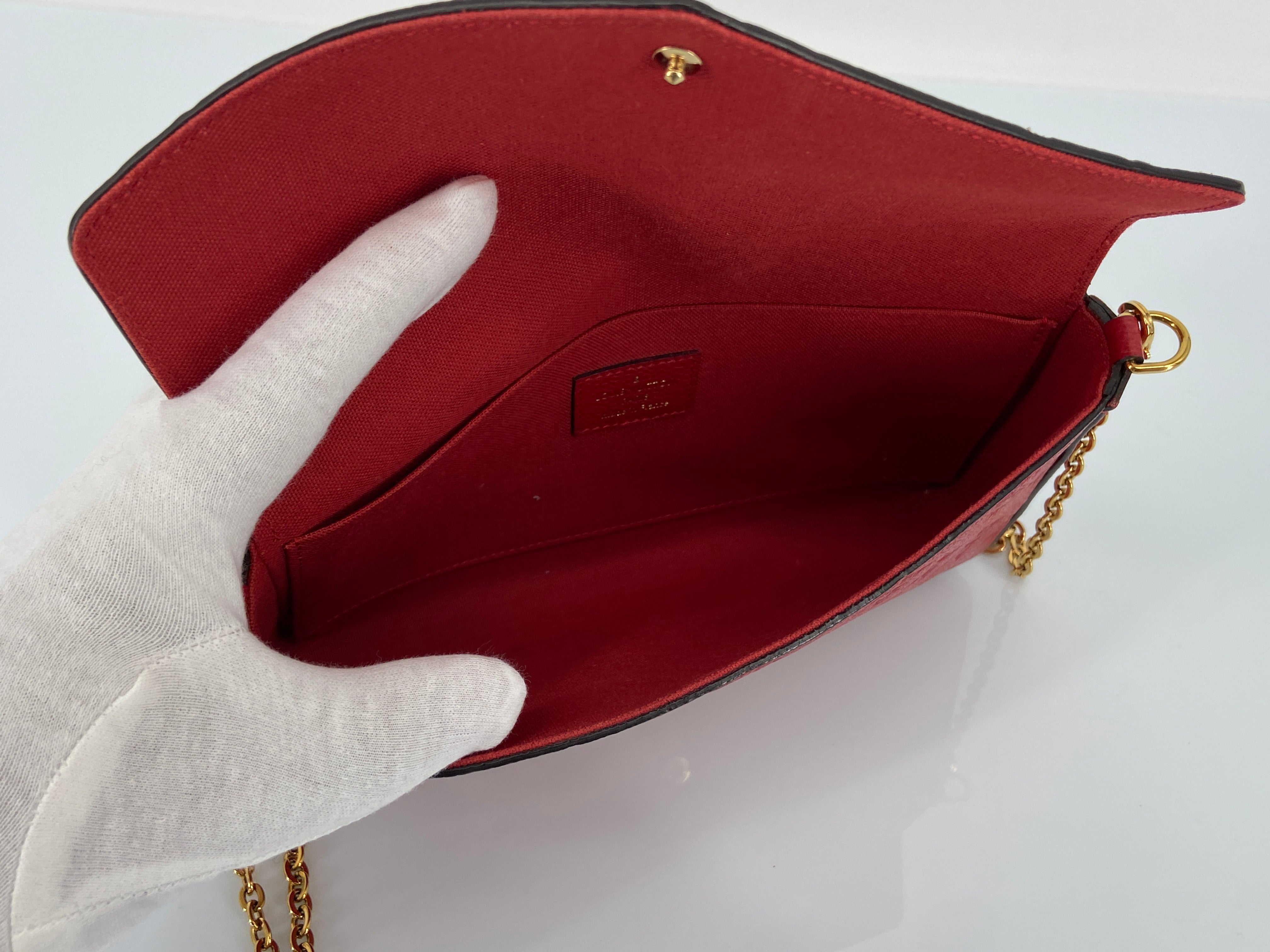 Louis Vuitton Félicie Pochette Red Empreinte Leather incl. Dustbag