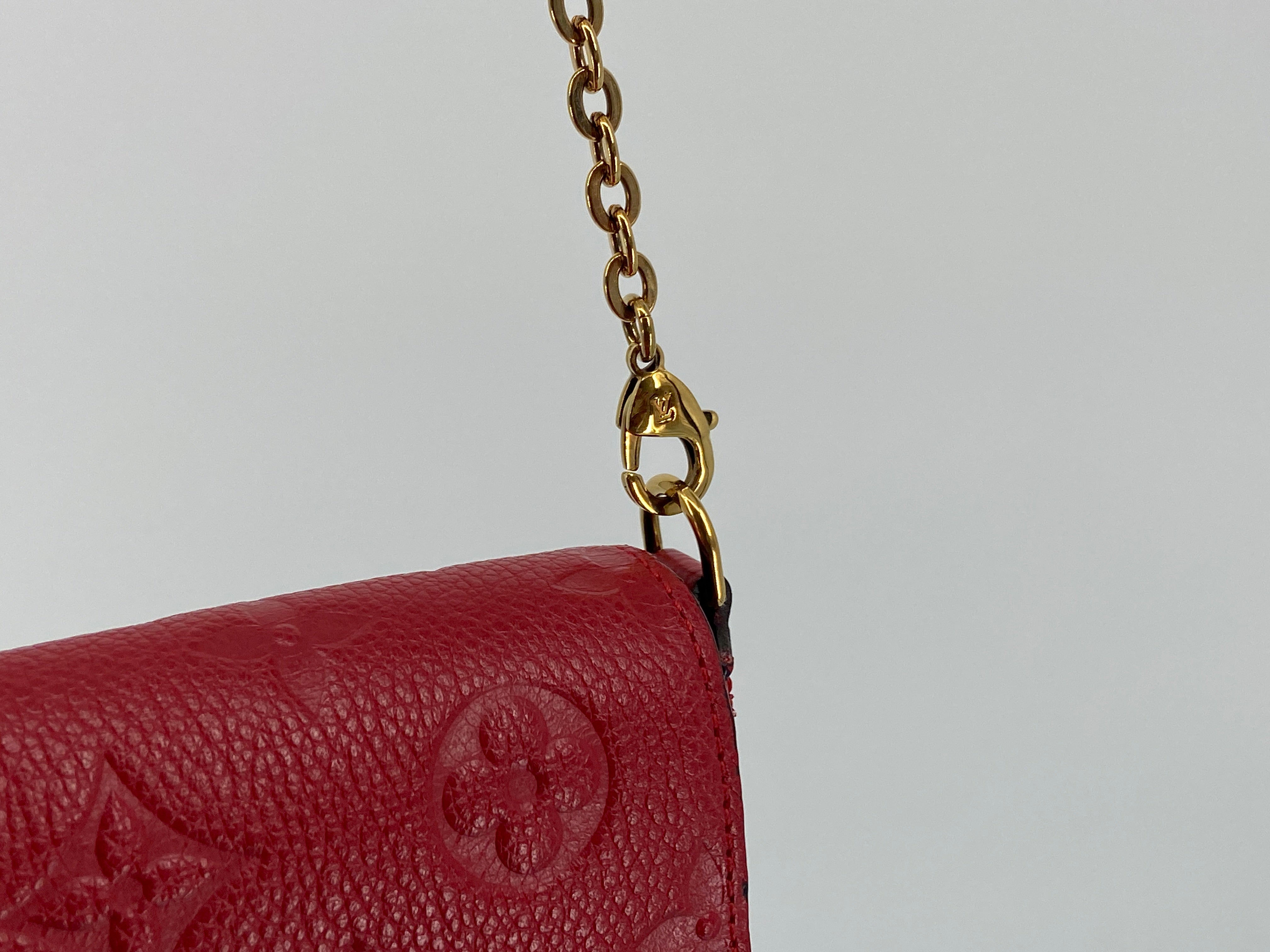 Louis Vuitton Félicie Pochette Red Empreinte Leather incl. Dustbag