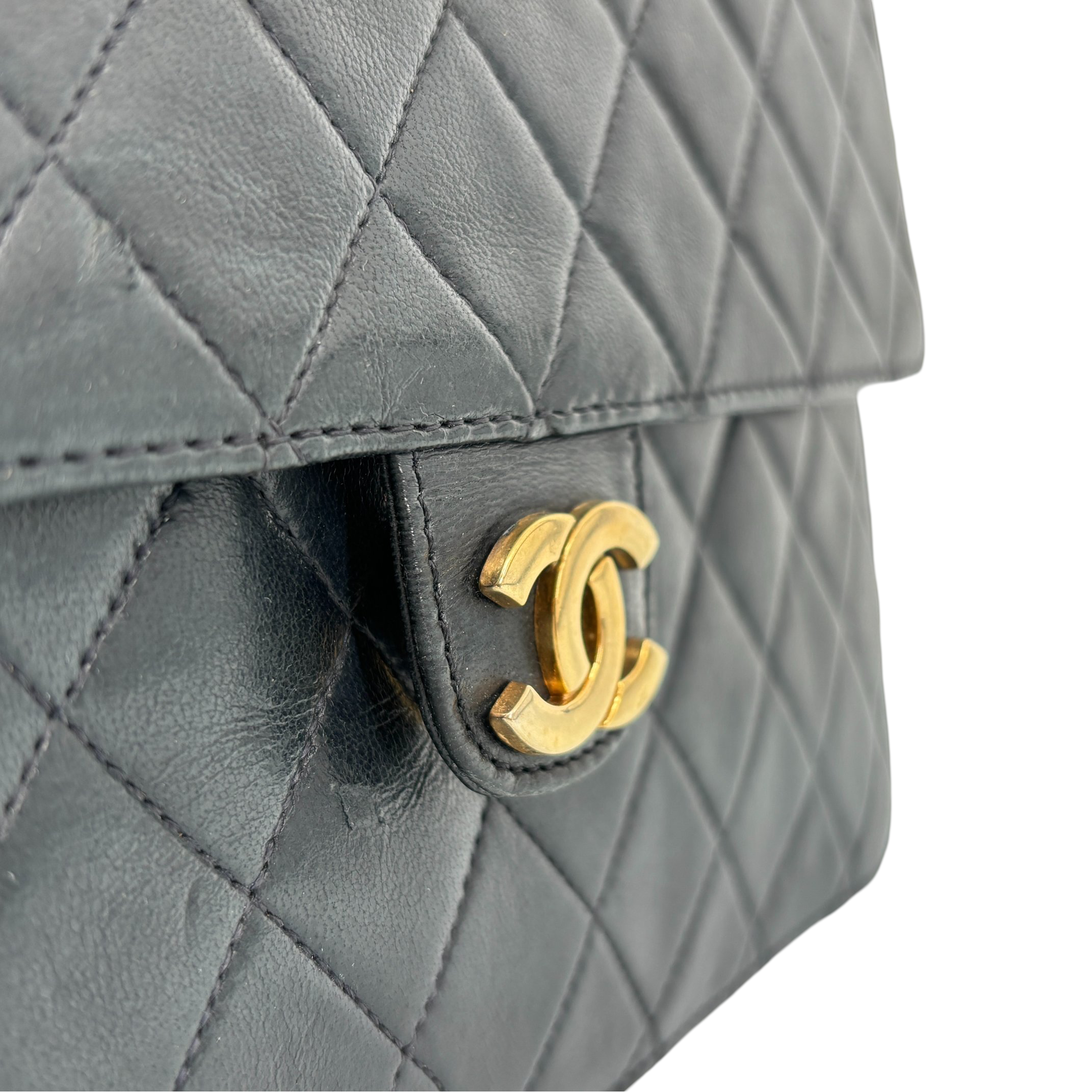 Chanel Single Flap Bag Push-Lock Black Matelassé Leather