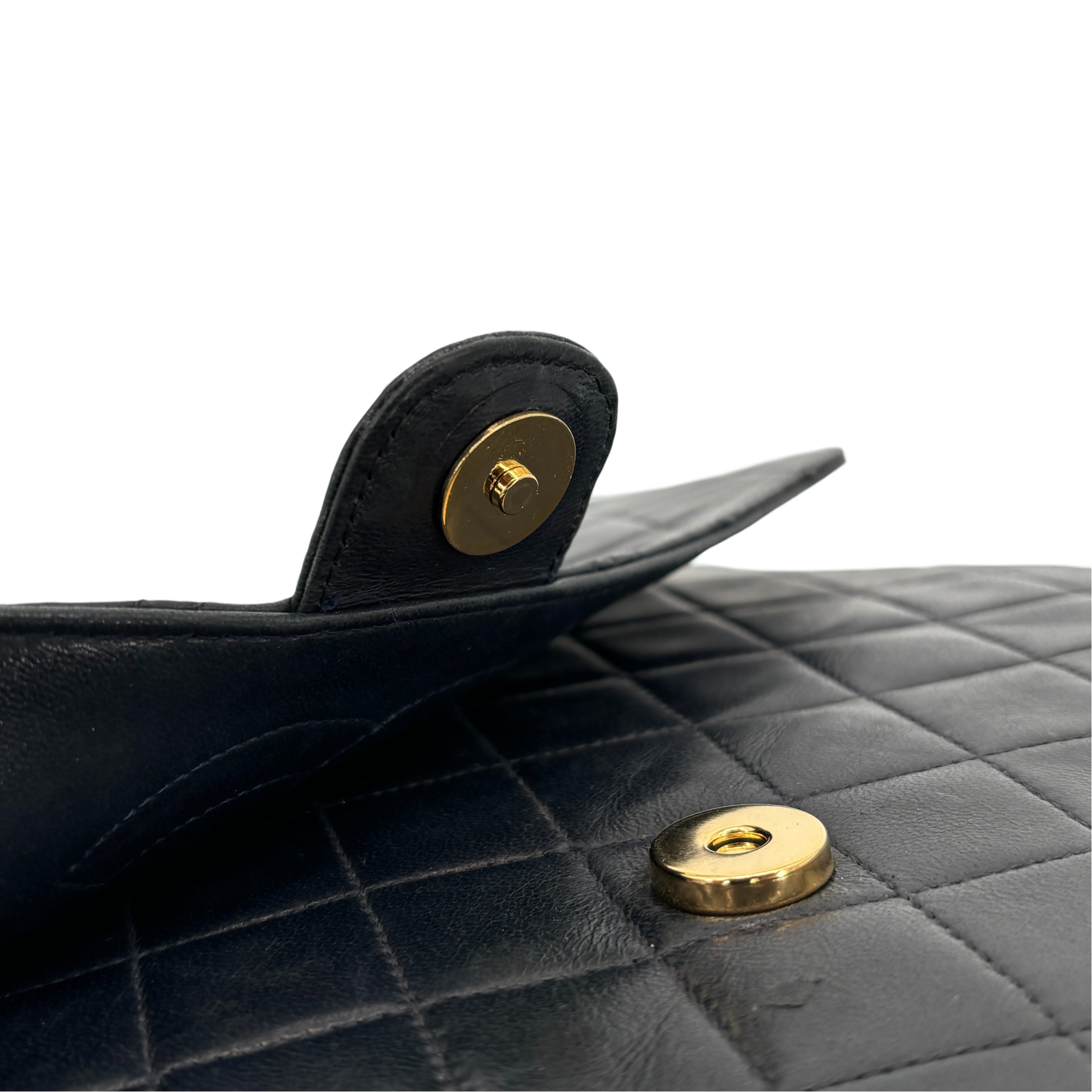 Chanel Single Flap Bag Push-Lock Black Matelassé Leather
