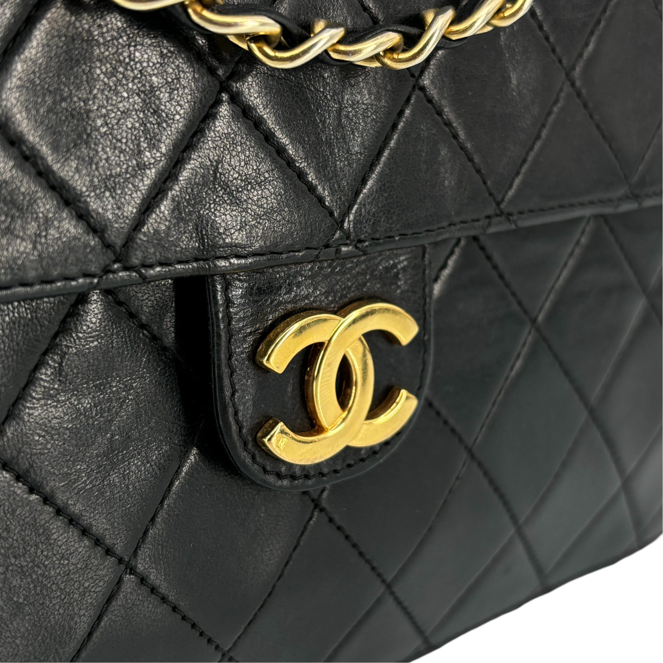 Chanel Single Flap Bag Push-Lock Black Matelassé Leather incl. Dustbag