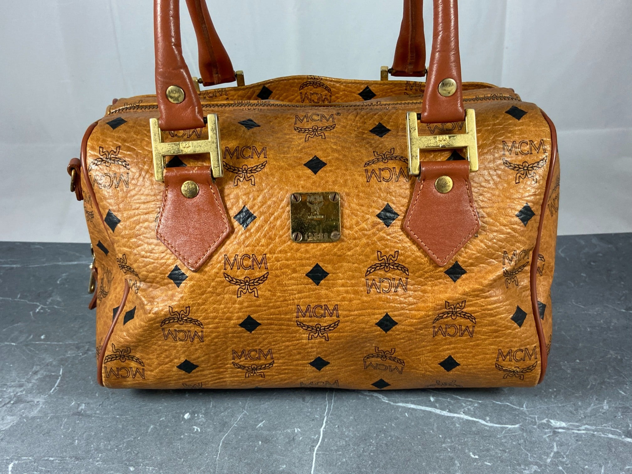 MCM Small Hand / Boston Bag Beige Visetos Cognac Monogram