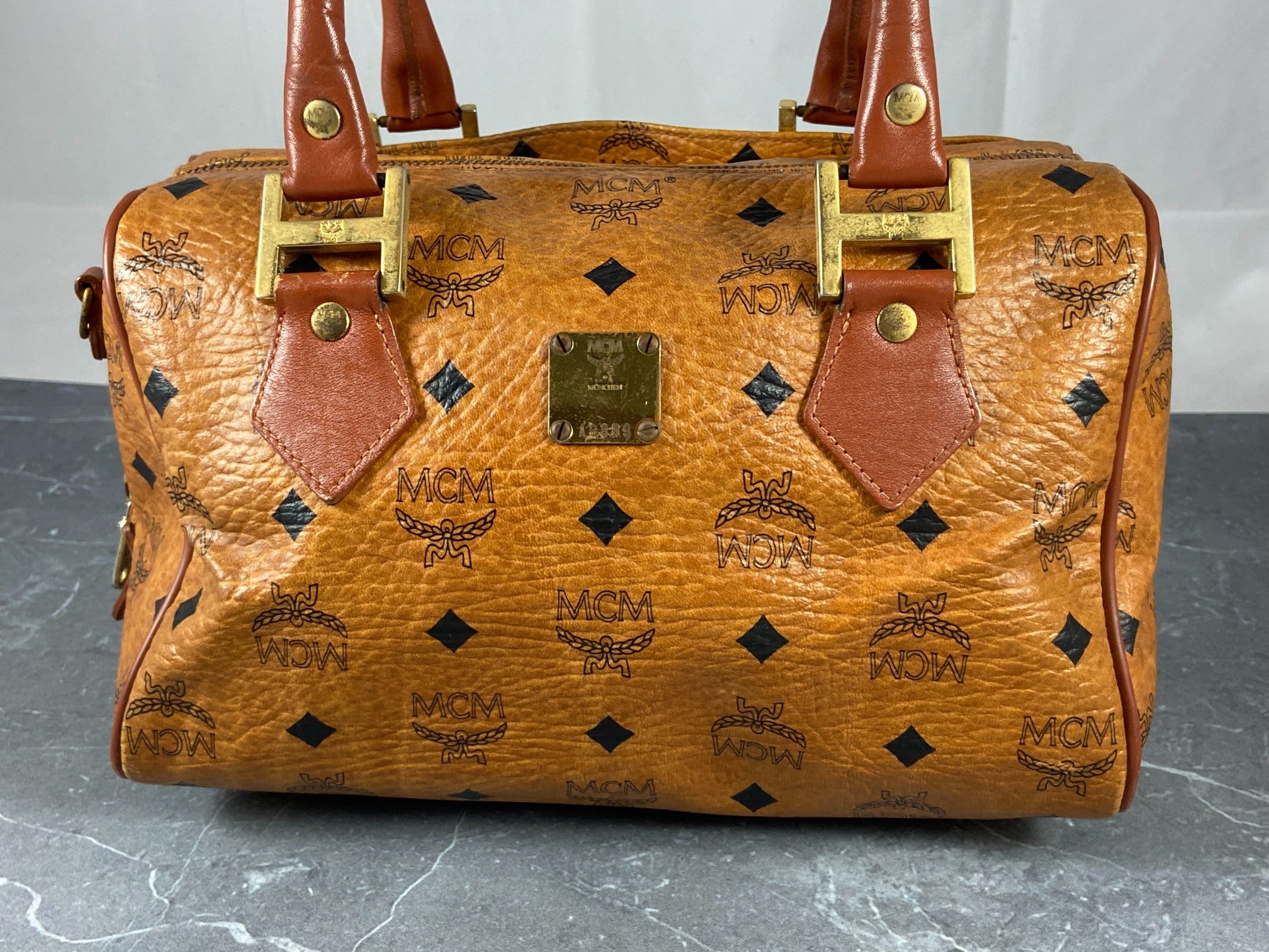 MCM Small Hand / Boston Bag Beige Visetos Cognac Monogram