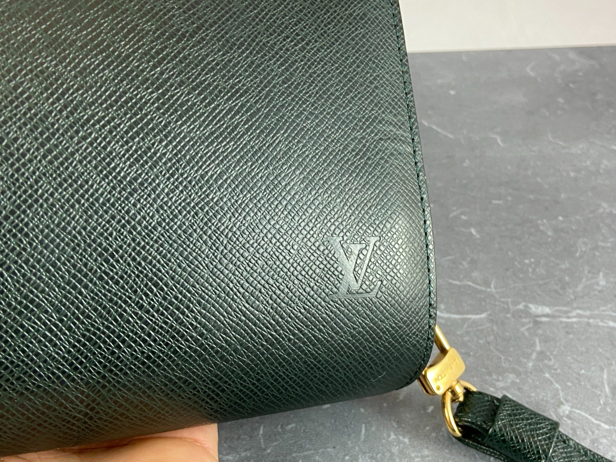 Louis Vuitton Baikal Clutch Epicea Green Taiga Leather