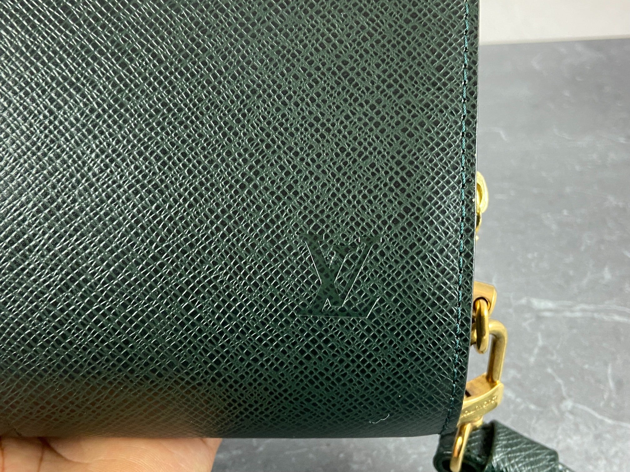 Louis Vuitton Baikal Clutch Epicea Green Taiga Leather