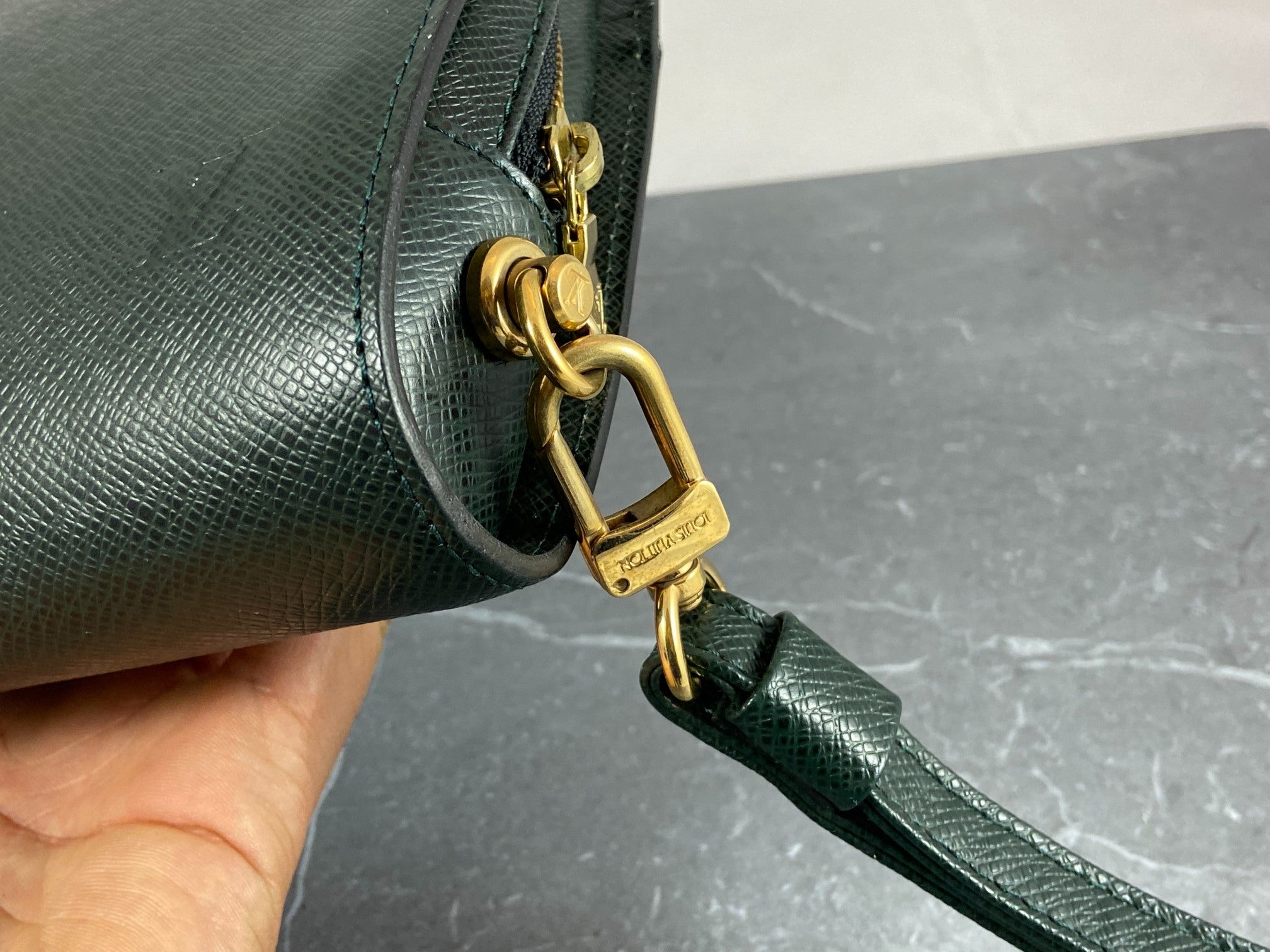 Louis Vuitton Baikal Clutch Epicea Green Taiga Leather