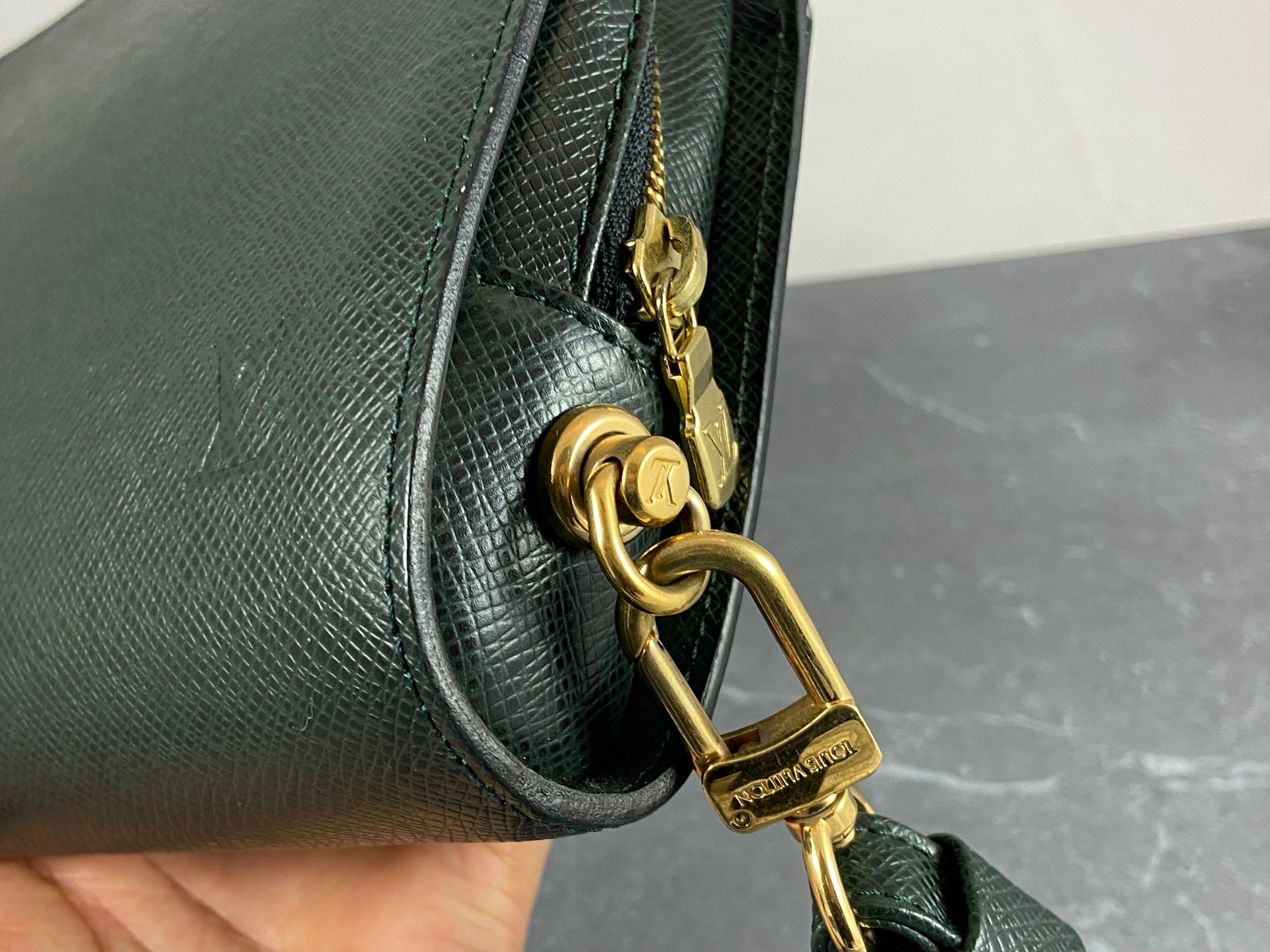 Louis Vuitton Baikal Clutch Epicea Green Taiga Leather