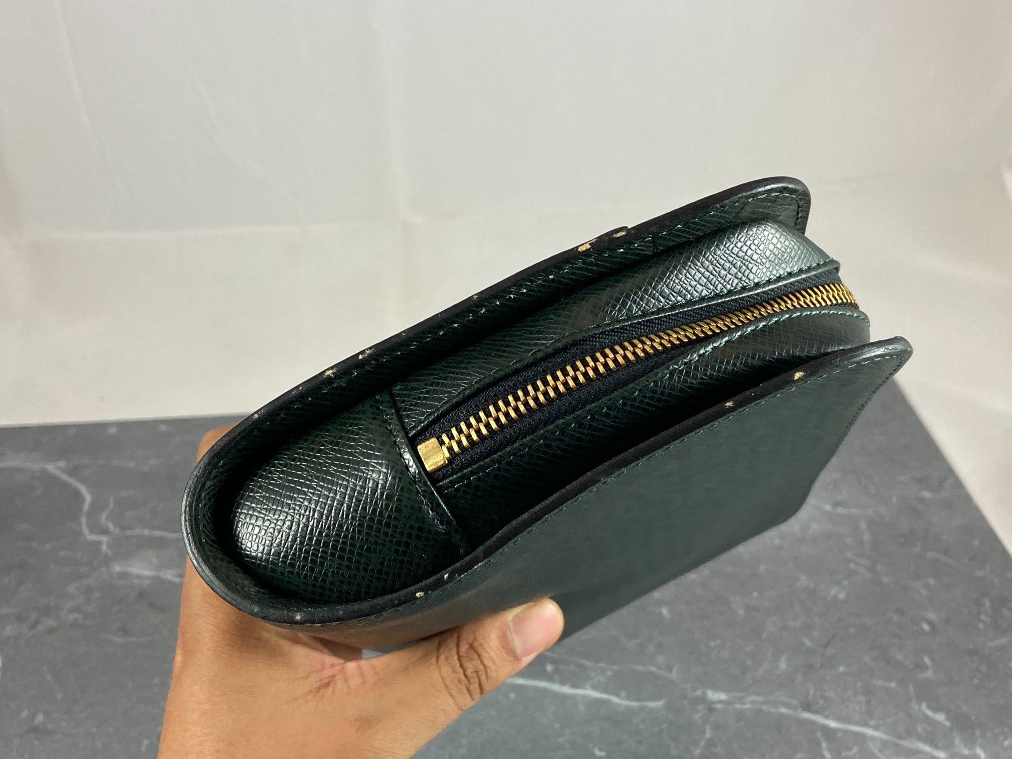 Louis Vuitton Baikal Clutch Epicea Green Taiga Leather