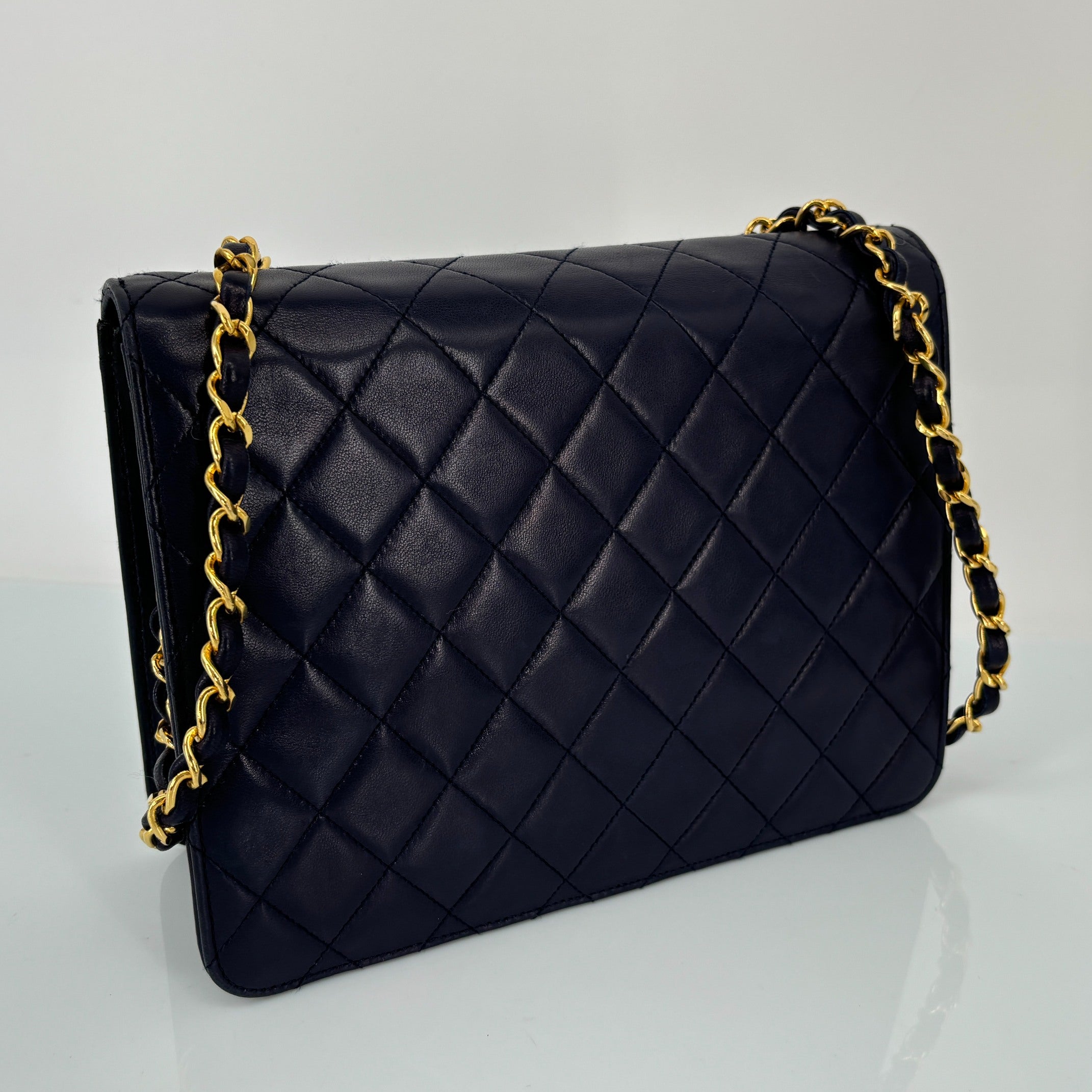 Chanel Single Flap Bag Push-Lock Navy Matelassé Leather incl. Dustbag