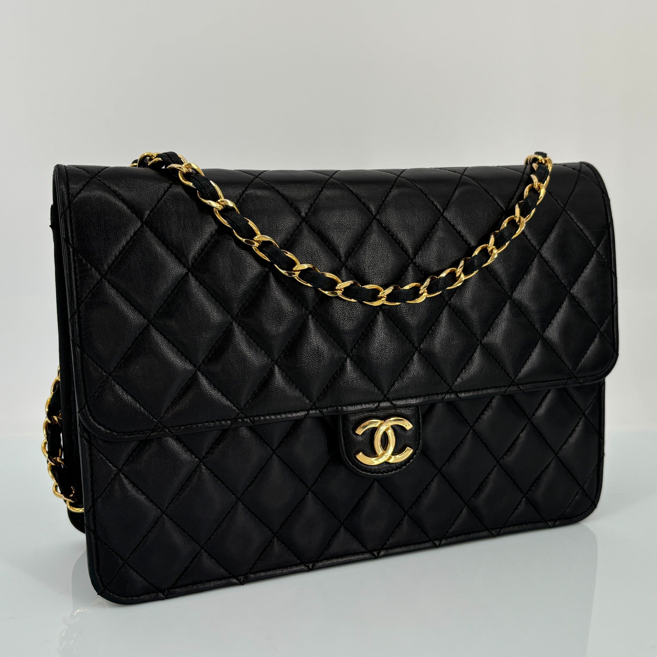 Chanel Single Flap Bag Push-Lock Black Matelassé Leather incl. Dustbag