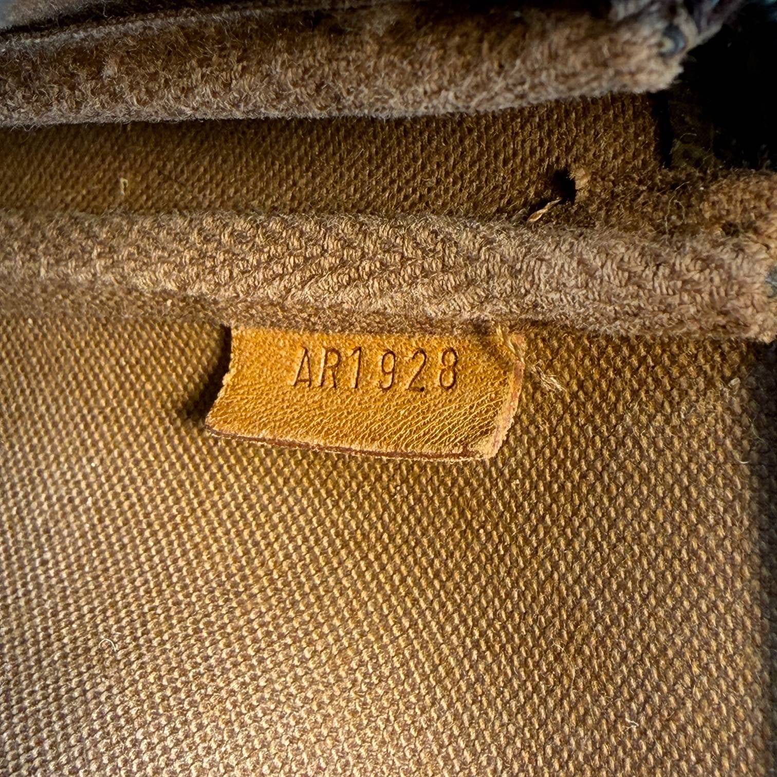 Louis Vuitton Pochette Accessoires Braun Monogram Canvas