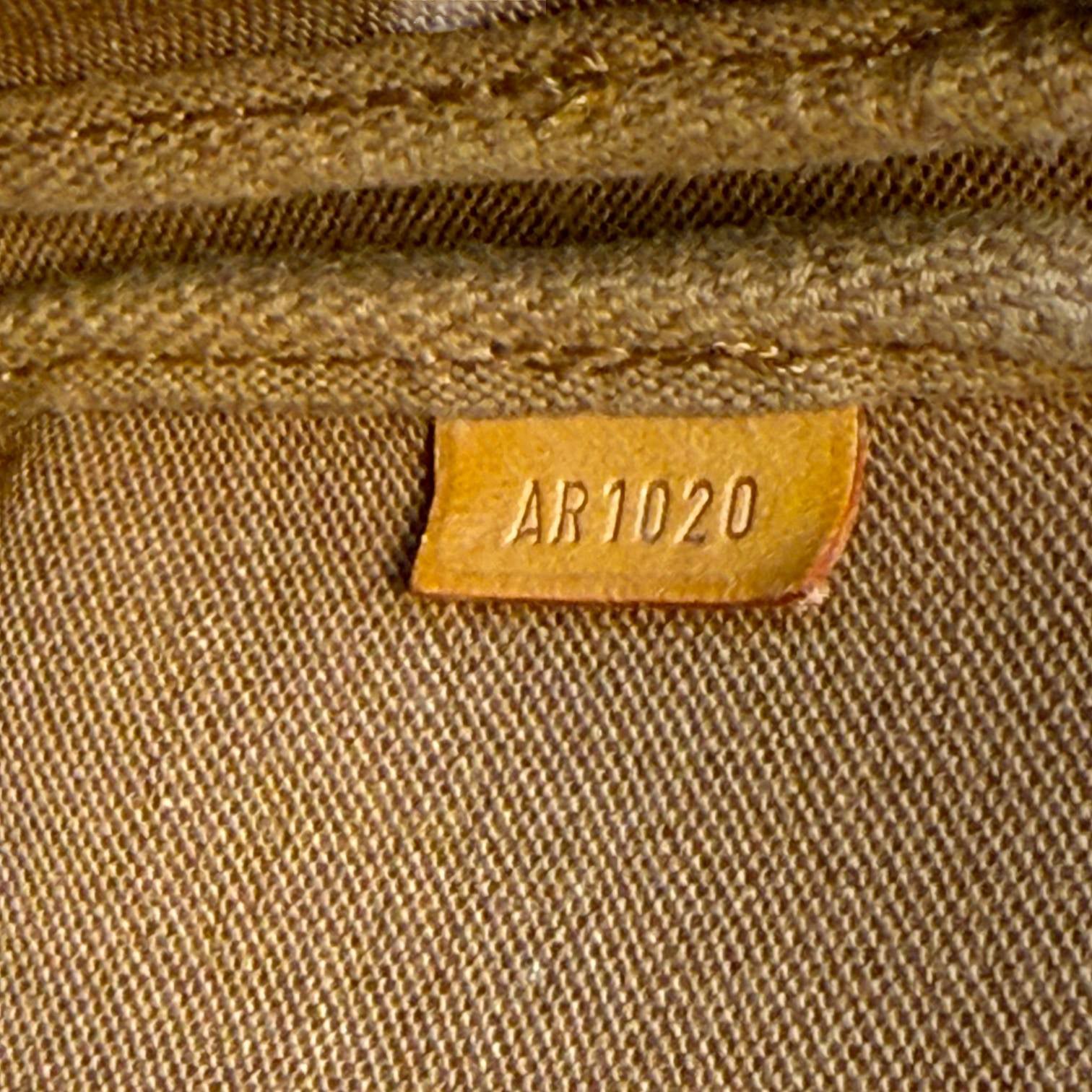 Louis Vuitton Pochette Accessoires Braun Monogram Canvas