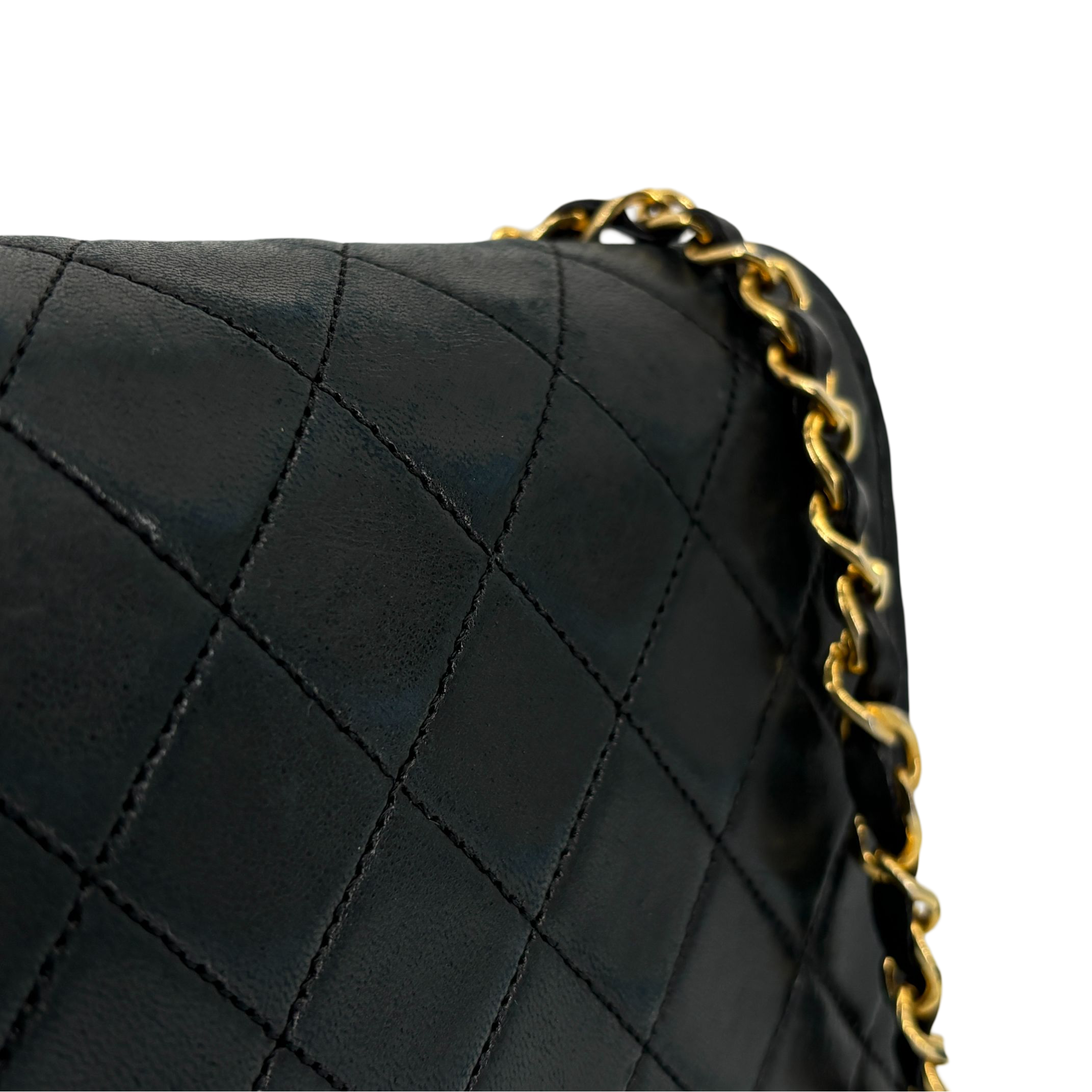 Chanel Single Flap Bag Push-Lock Black Matelassé Leather