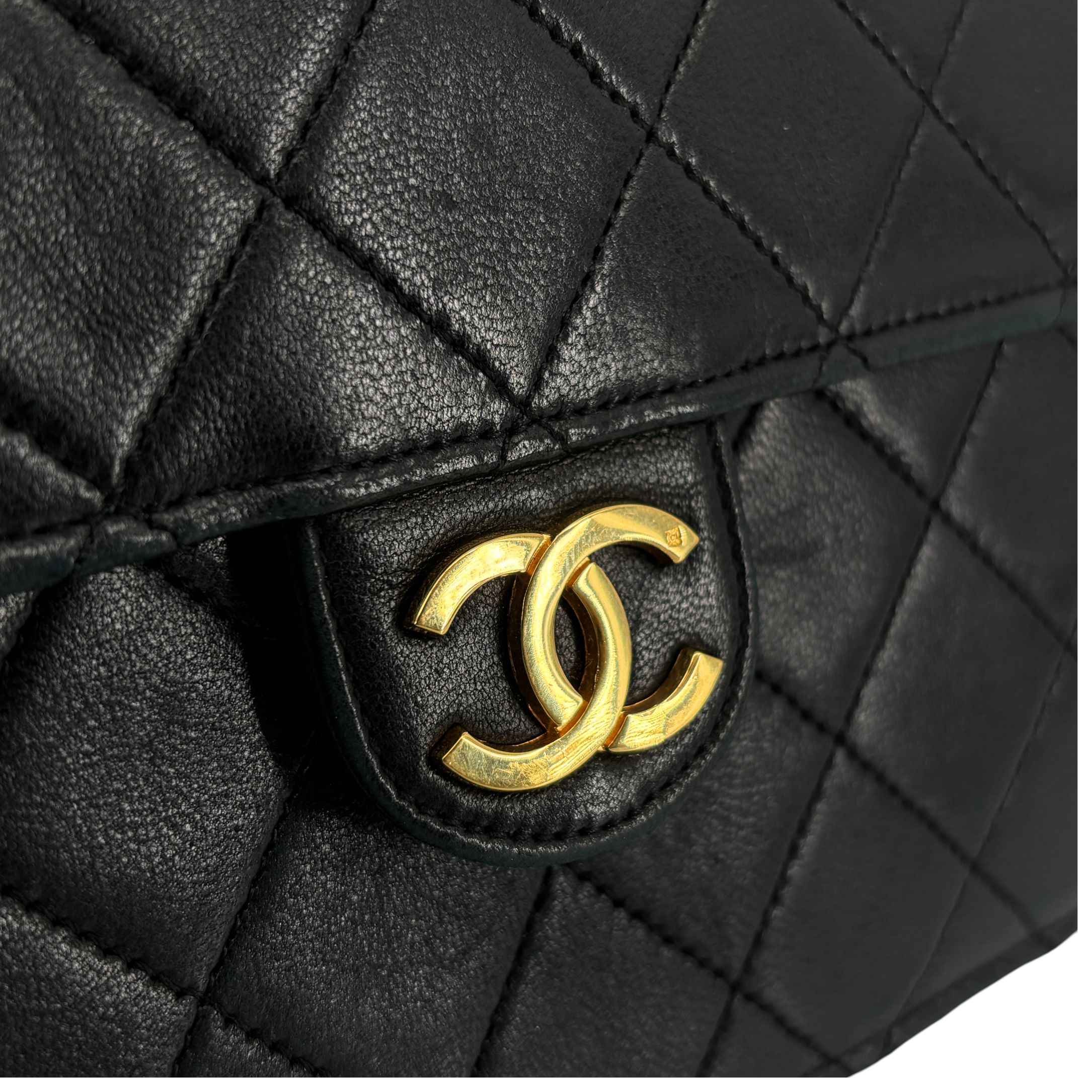 Chanel Single Flap Bag Push-Lock Black Matelassé Leather