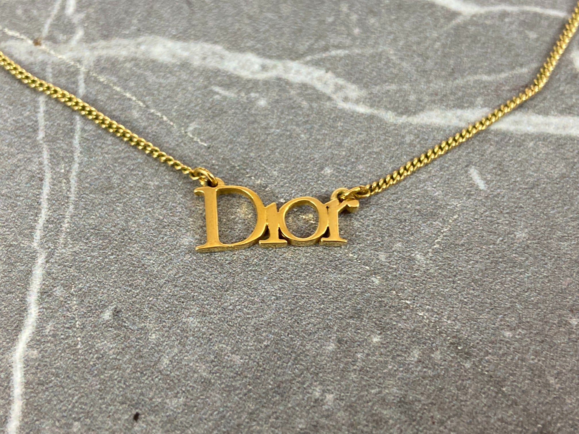 Dior spell out necklace hotsell