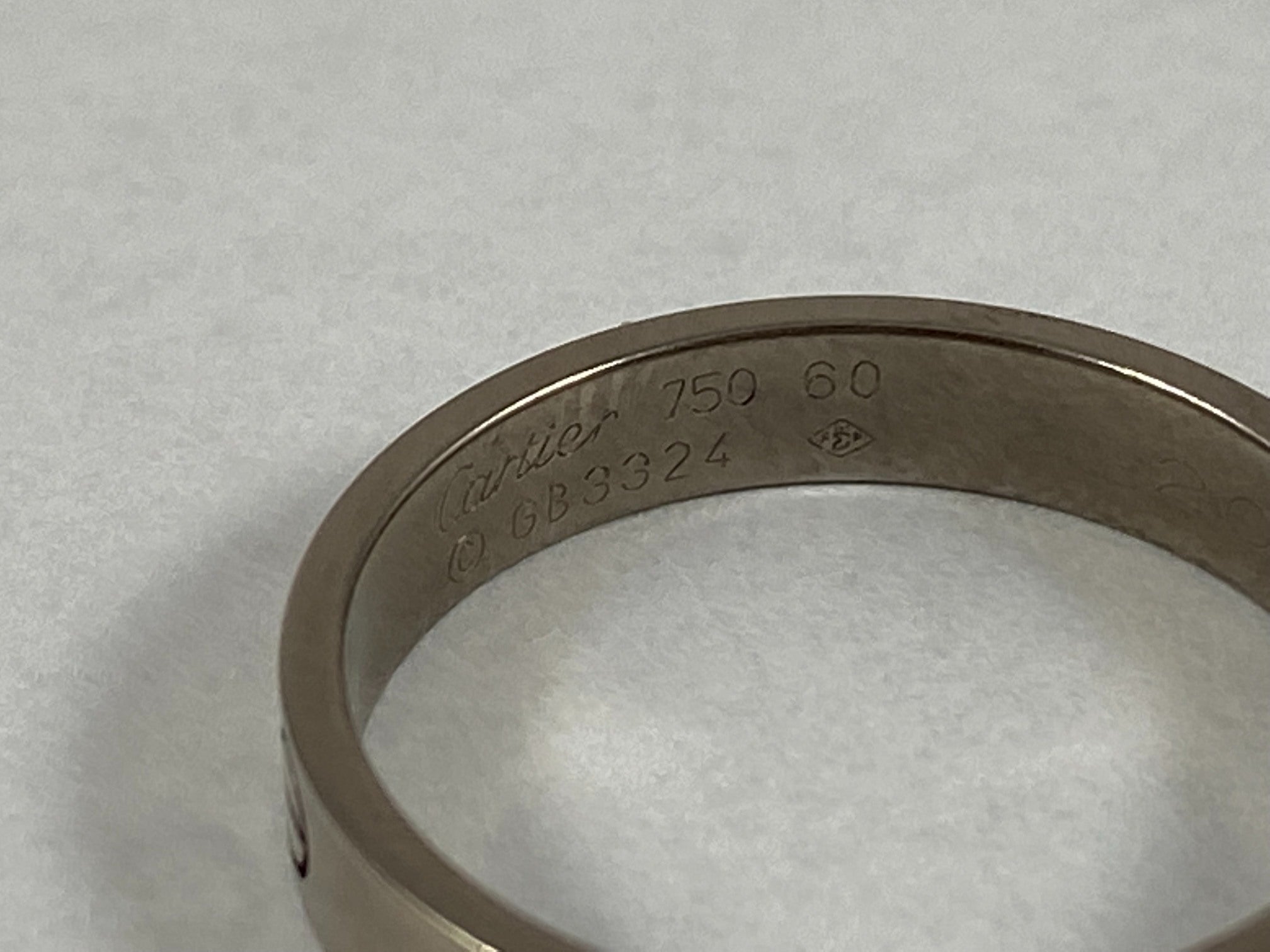 Cartier ring hot sale serial number