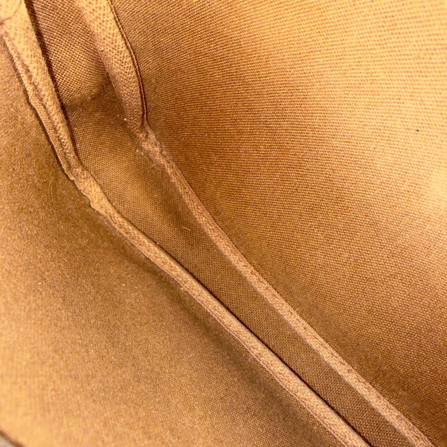 Louis Vuitton Pochette Accessoires Braun Monogram Canvas