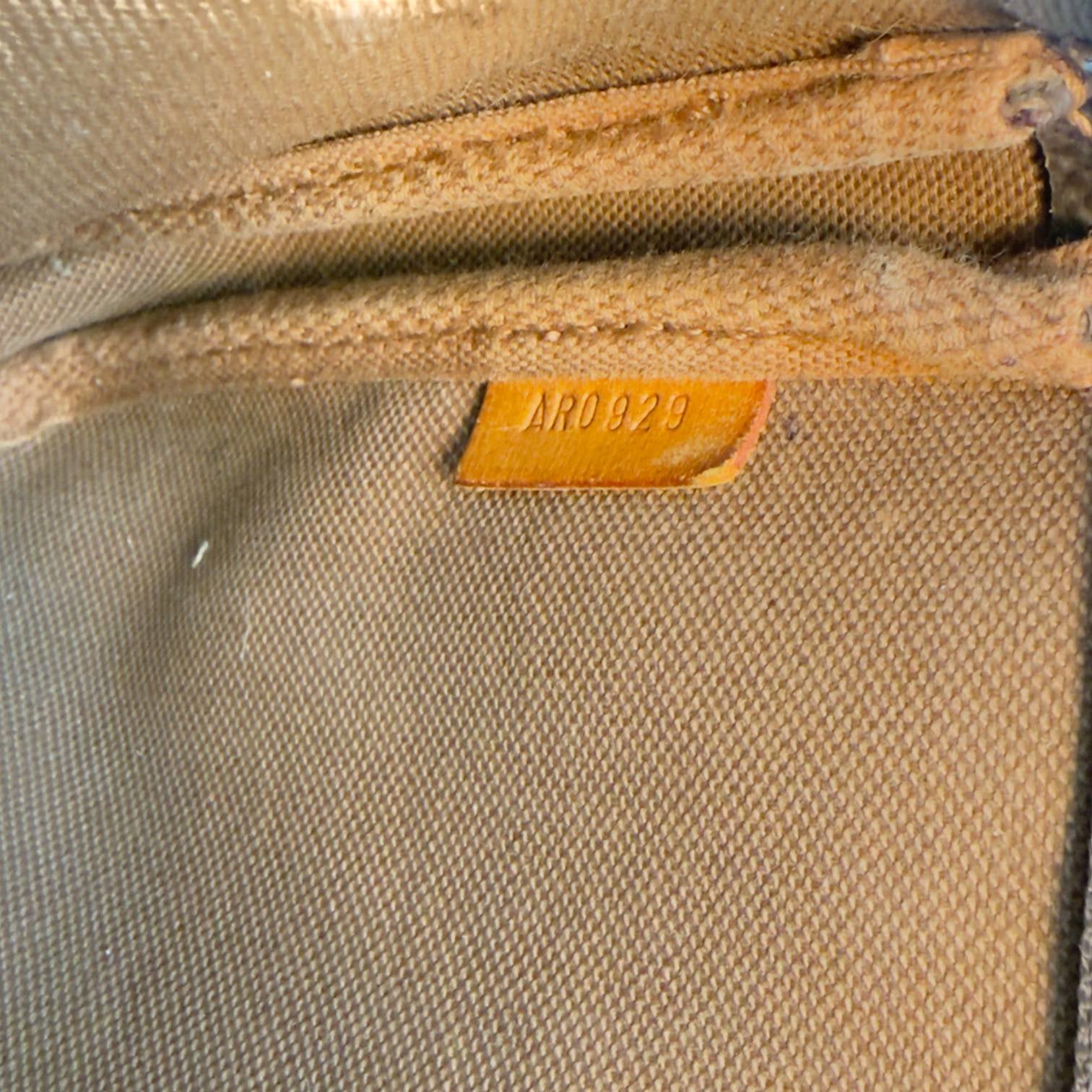 Louis Vuitton Pochette Accessoires Braun Monogram Canvas