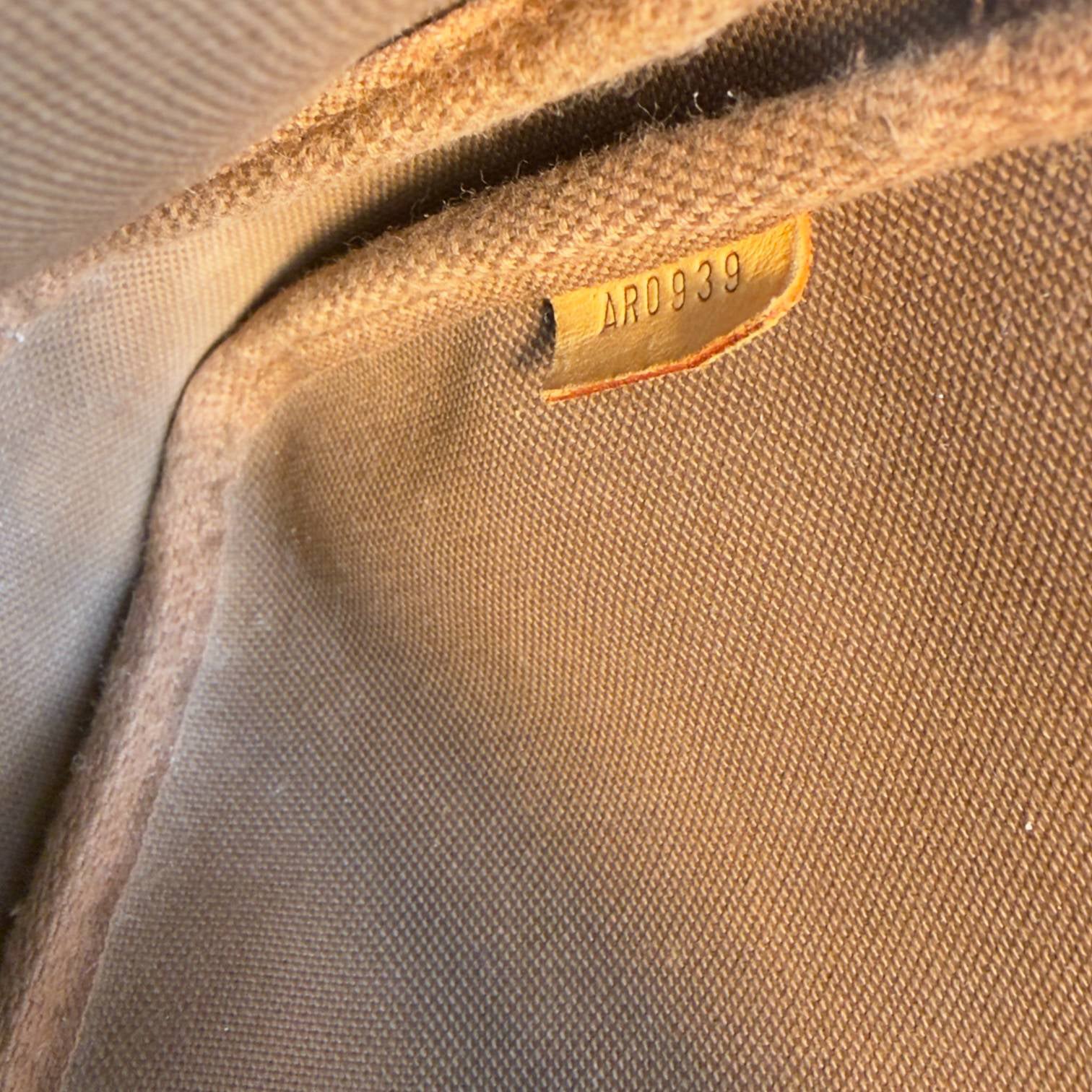 Louis Vuitton Pochette Accessoires Braun Monogram Canvas
