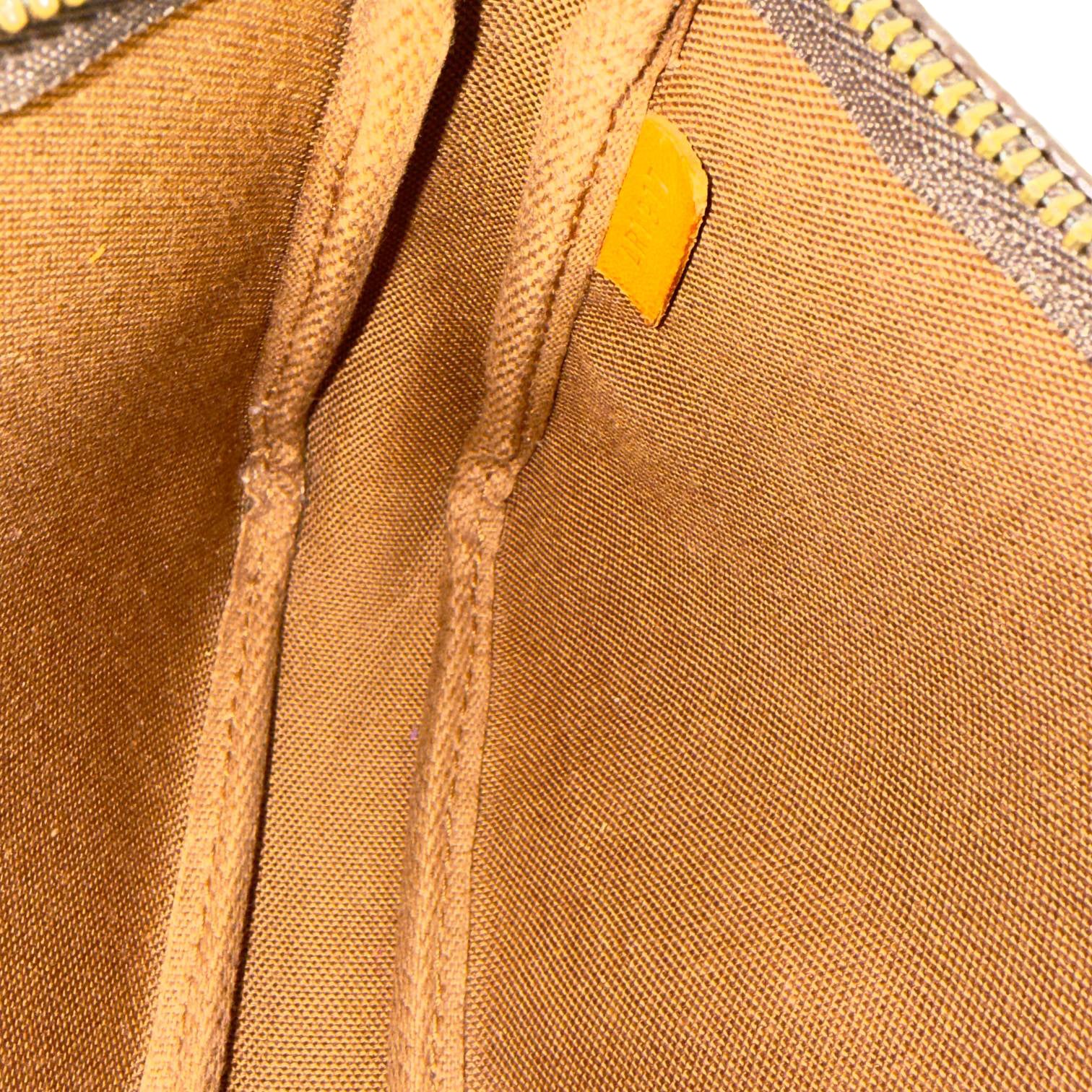 Louis Vuitton Pochette Accessoires Braun Monogram Canvas