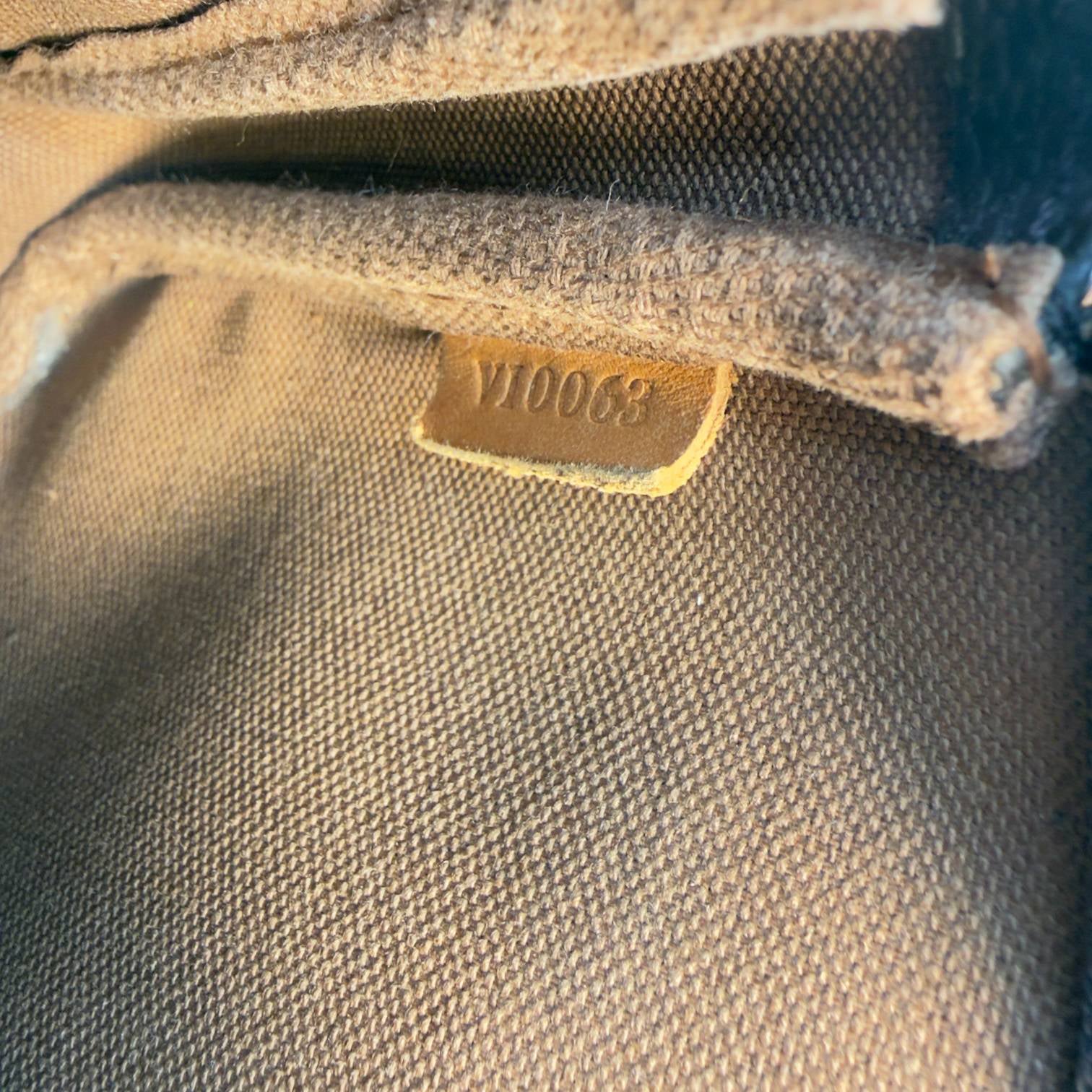 Louis Vuitton Pochette Accessoires Braun Monogram Canvas