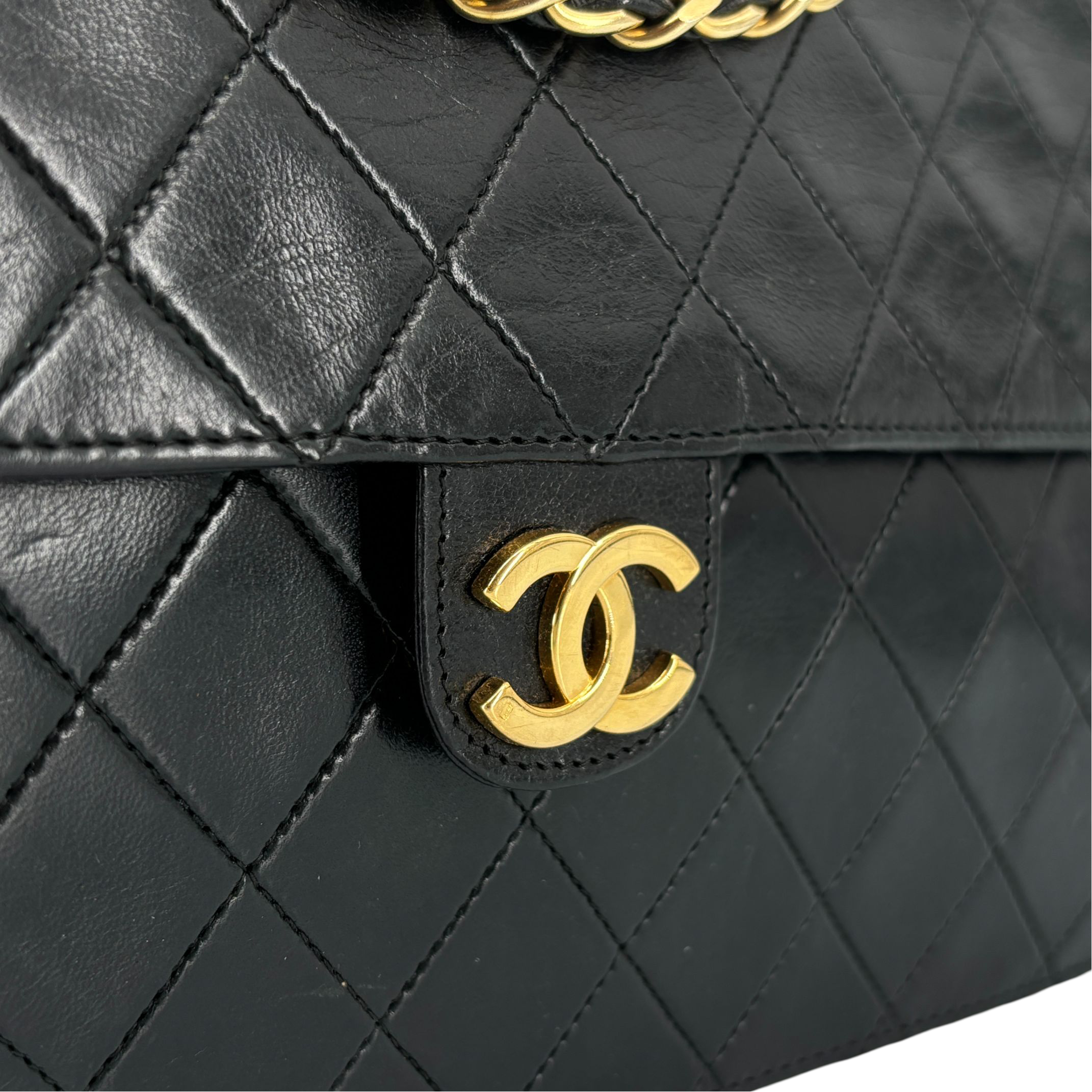 Chanel Single Flap Bag Push-Lock Black Matelassé Leather