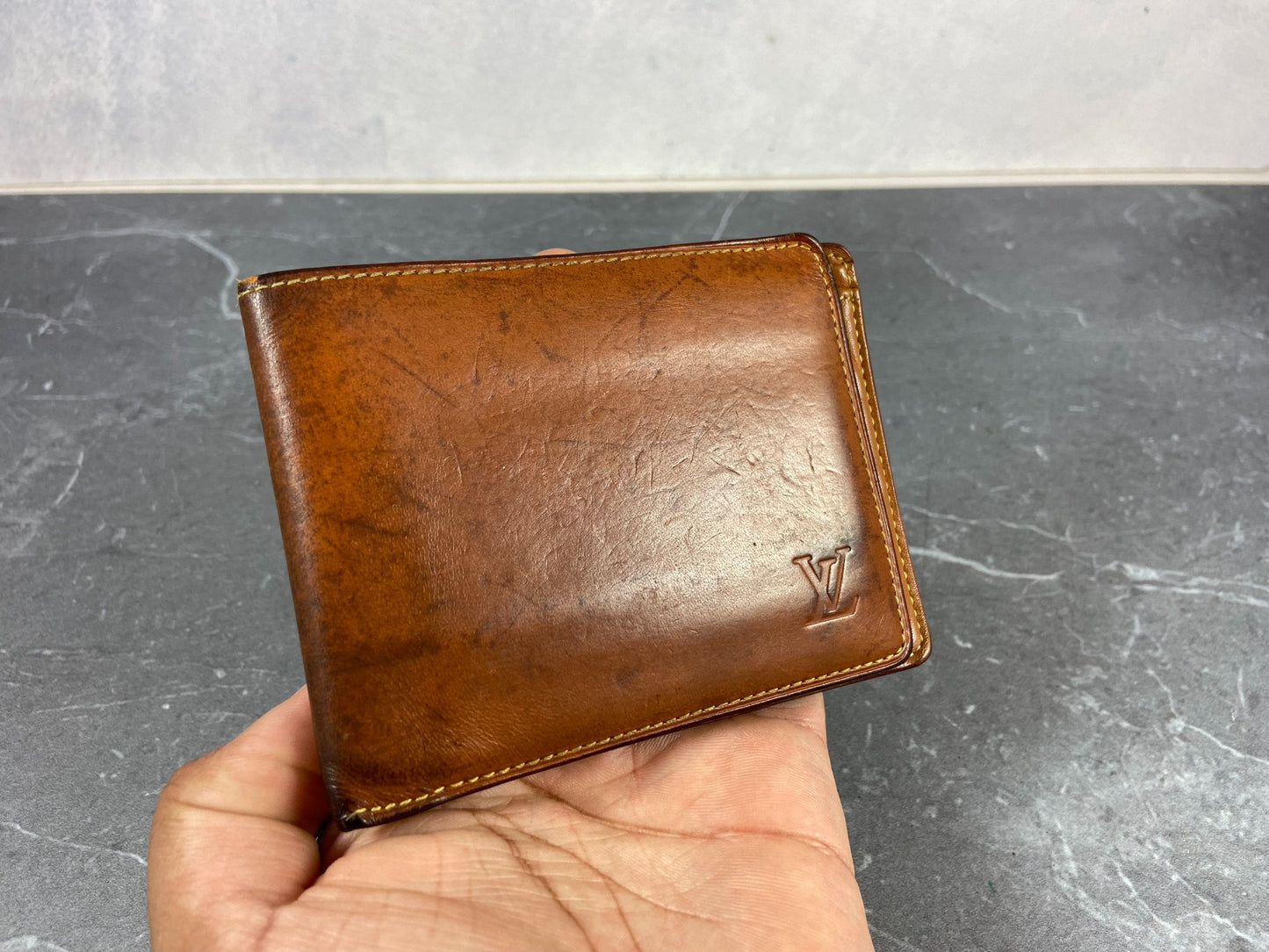 Louis Vuitton Multiple Wallet Brown Nomade Leather
