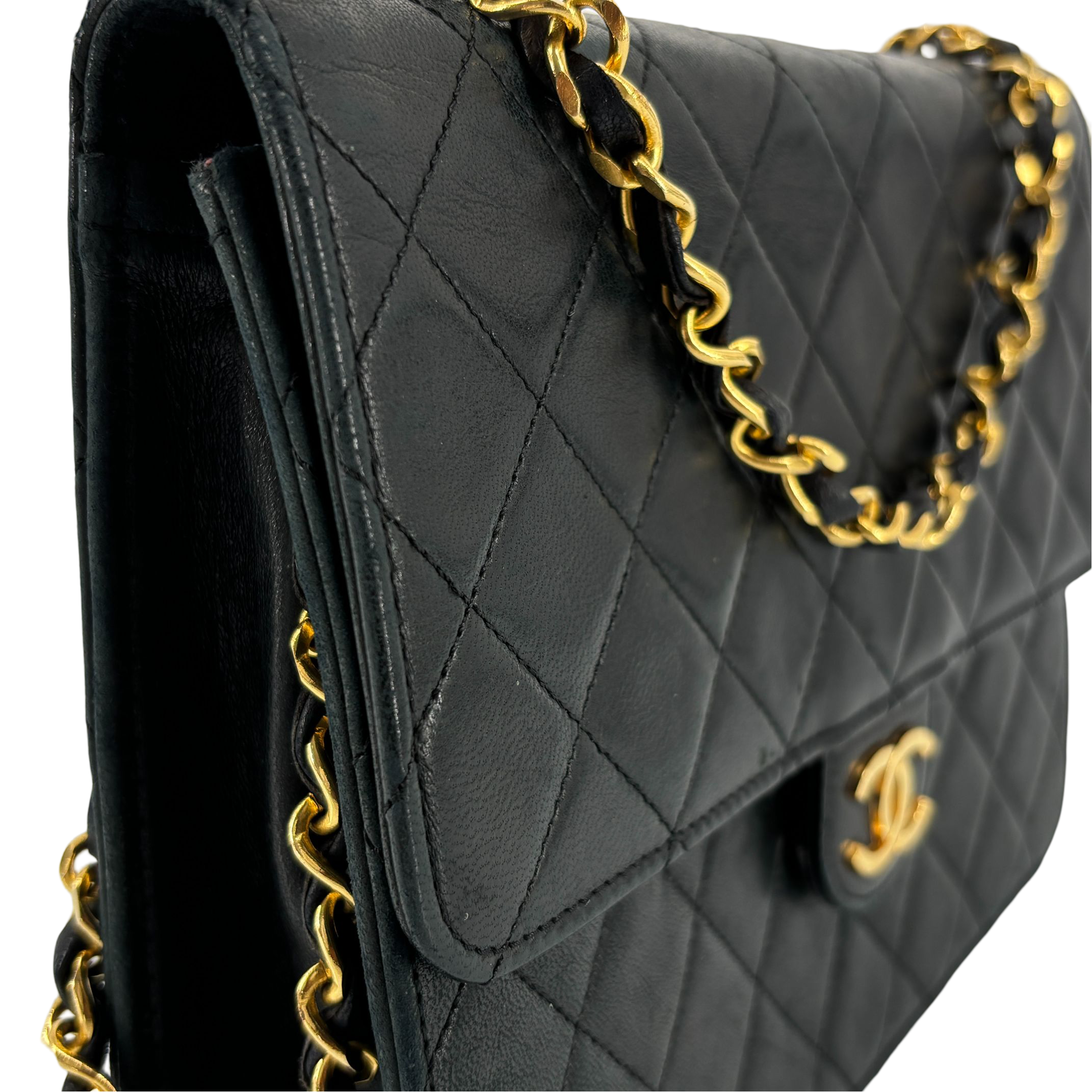 Chanel Single Flap Bag Push-Lock Black Matelassé Leather