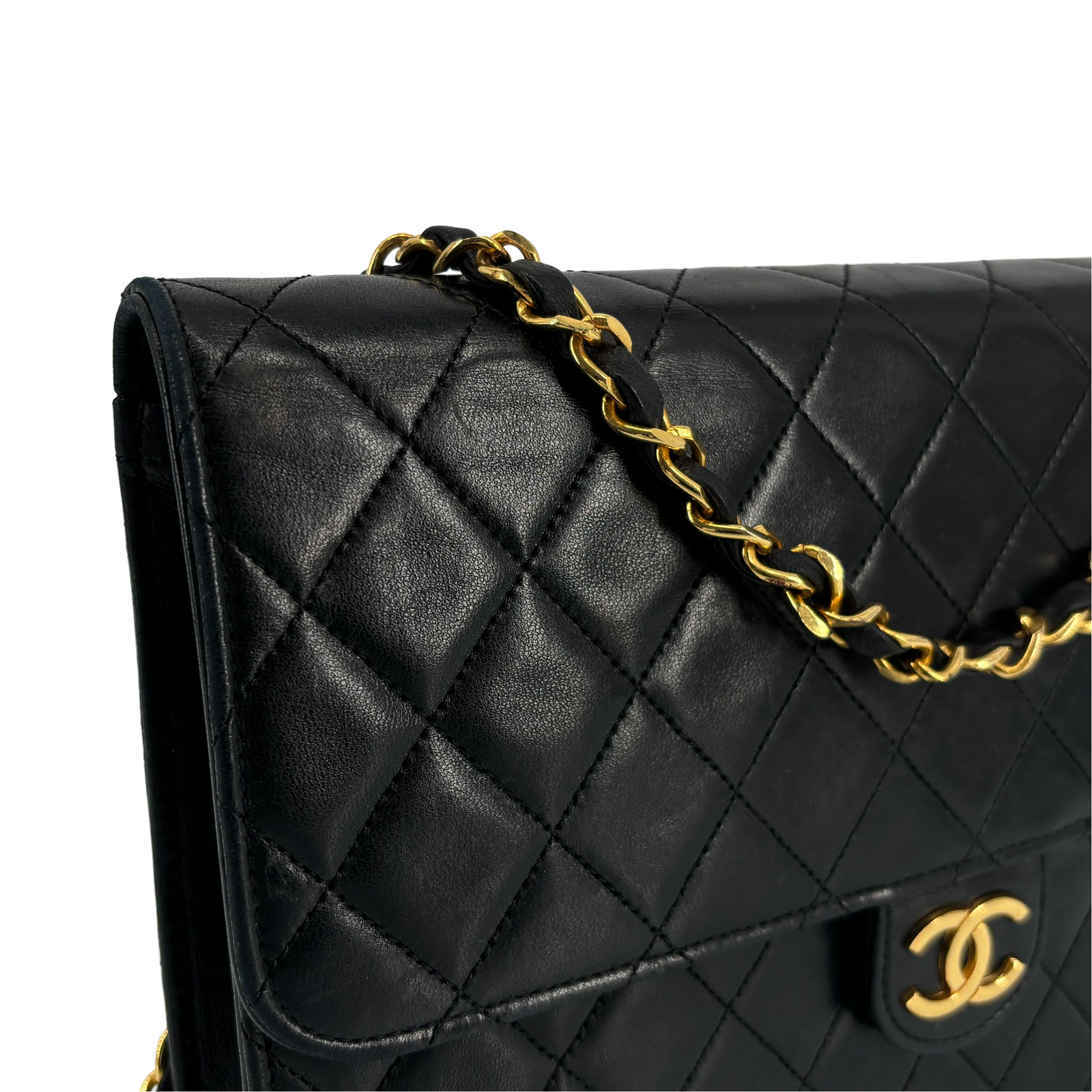 Chanel Single Flap Bag Push-Lock Black Matelassé Leather