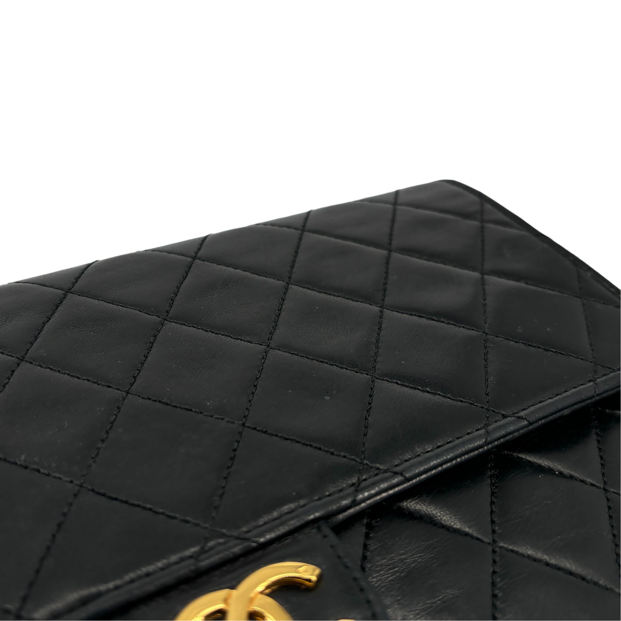 Chanel Single Flap Bag Push-Lock Black Matelassé Leather