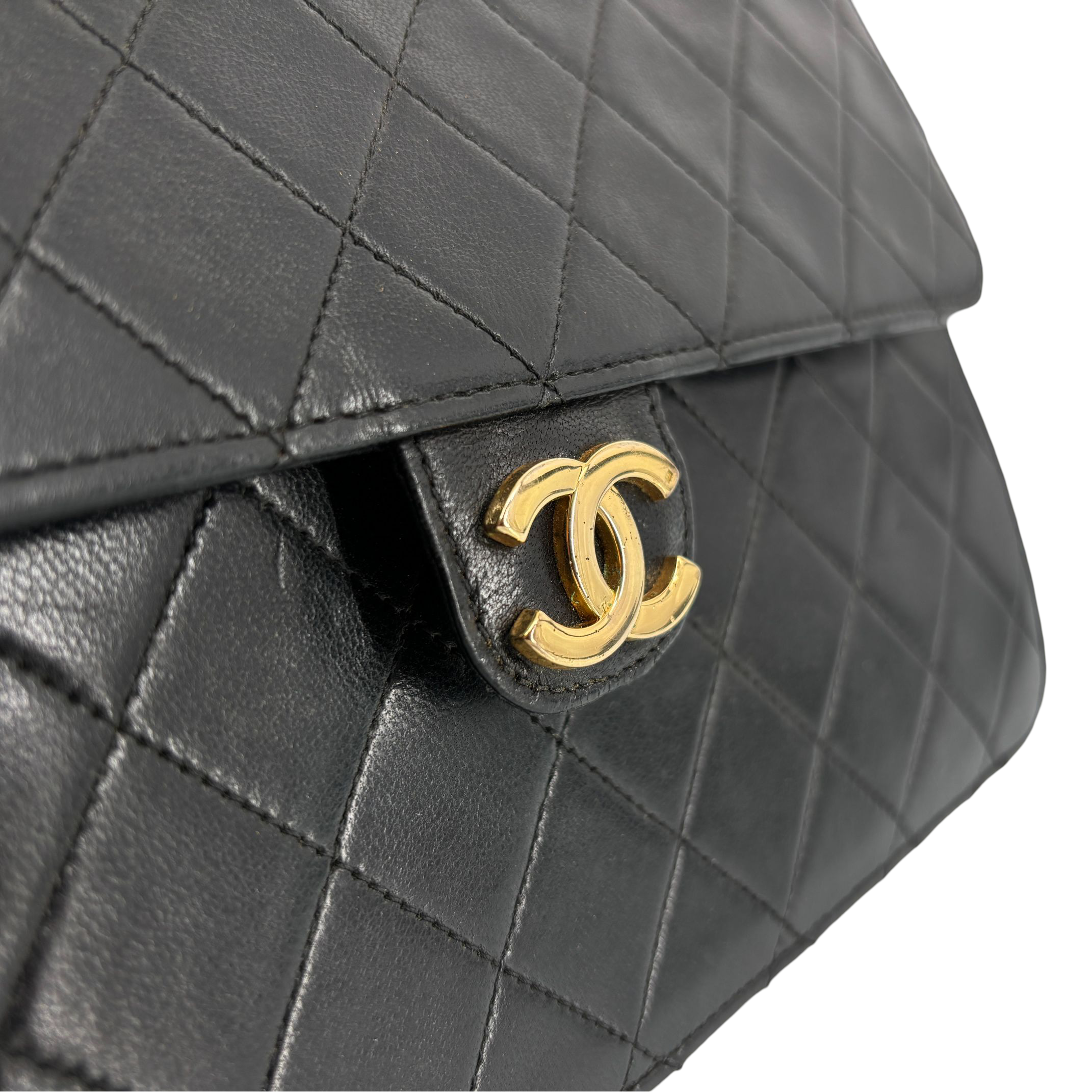 Chanel Single Flap Bag Push-Lock Black Matelassé Leather