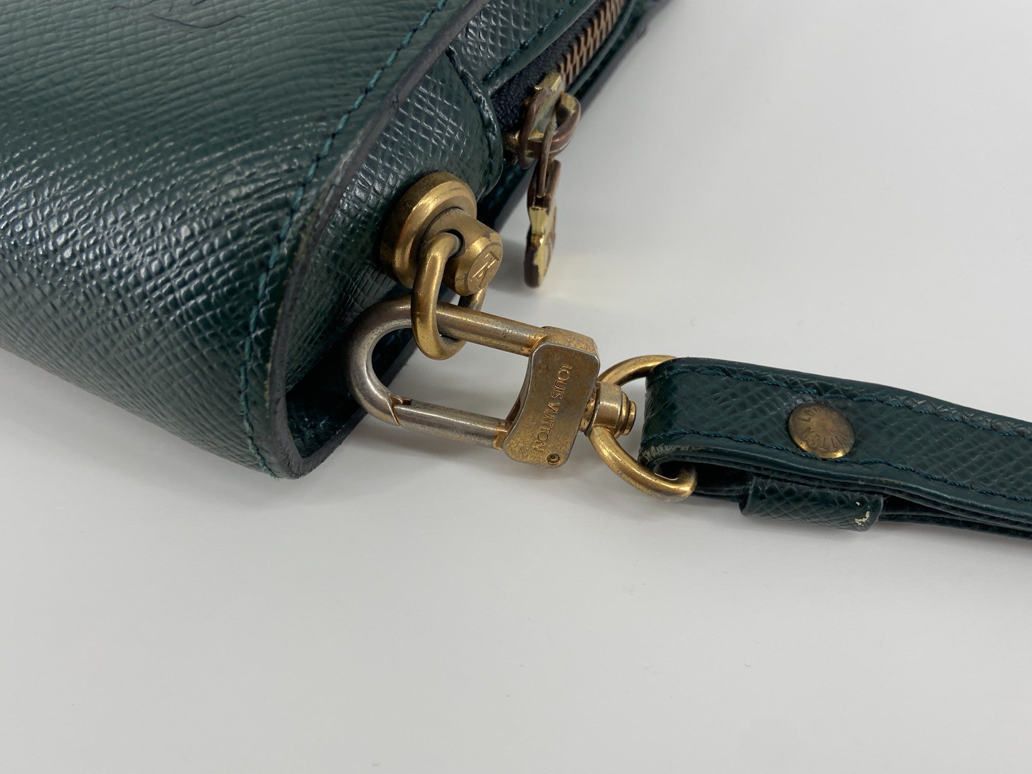 Louis Vuitton Baikal Clutch Epicea Green Taiga Leather