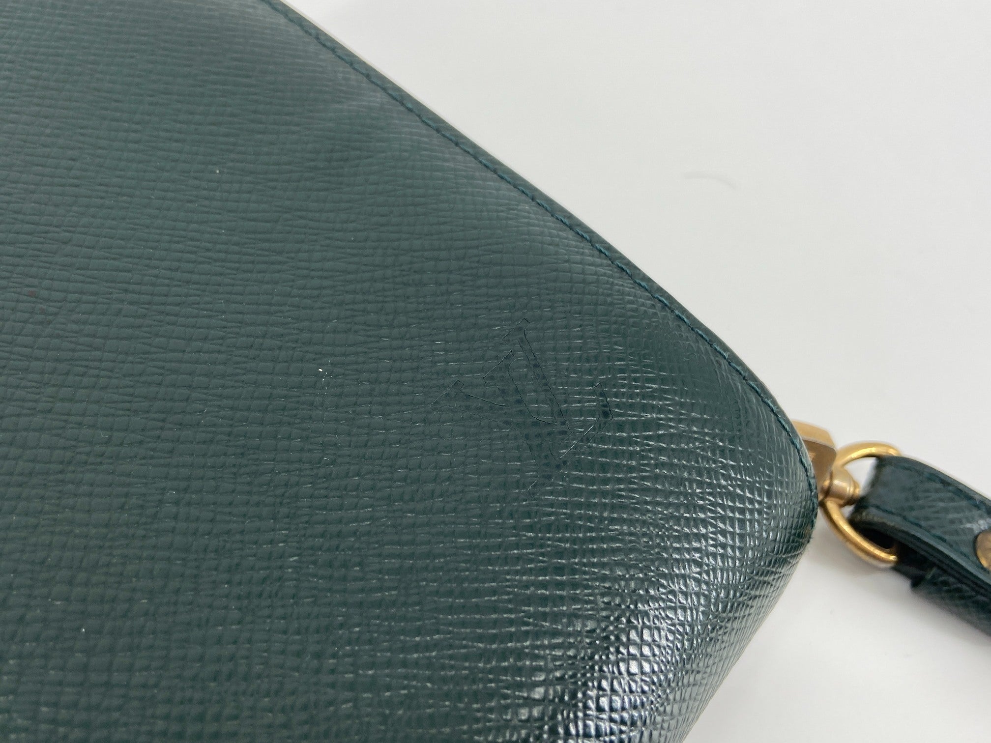 Louis Vuitton Baikal Clutch Epicea Green Taiga Leather