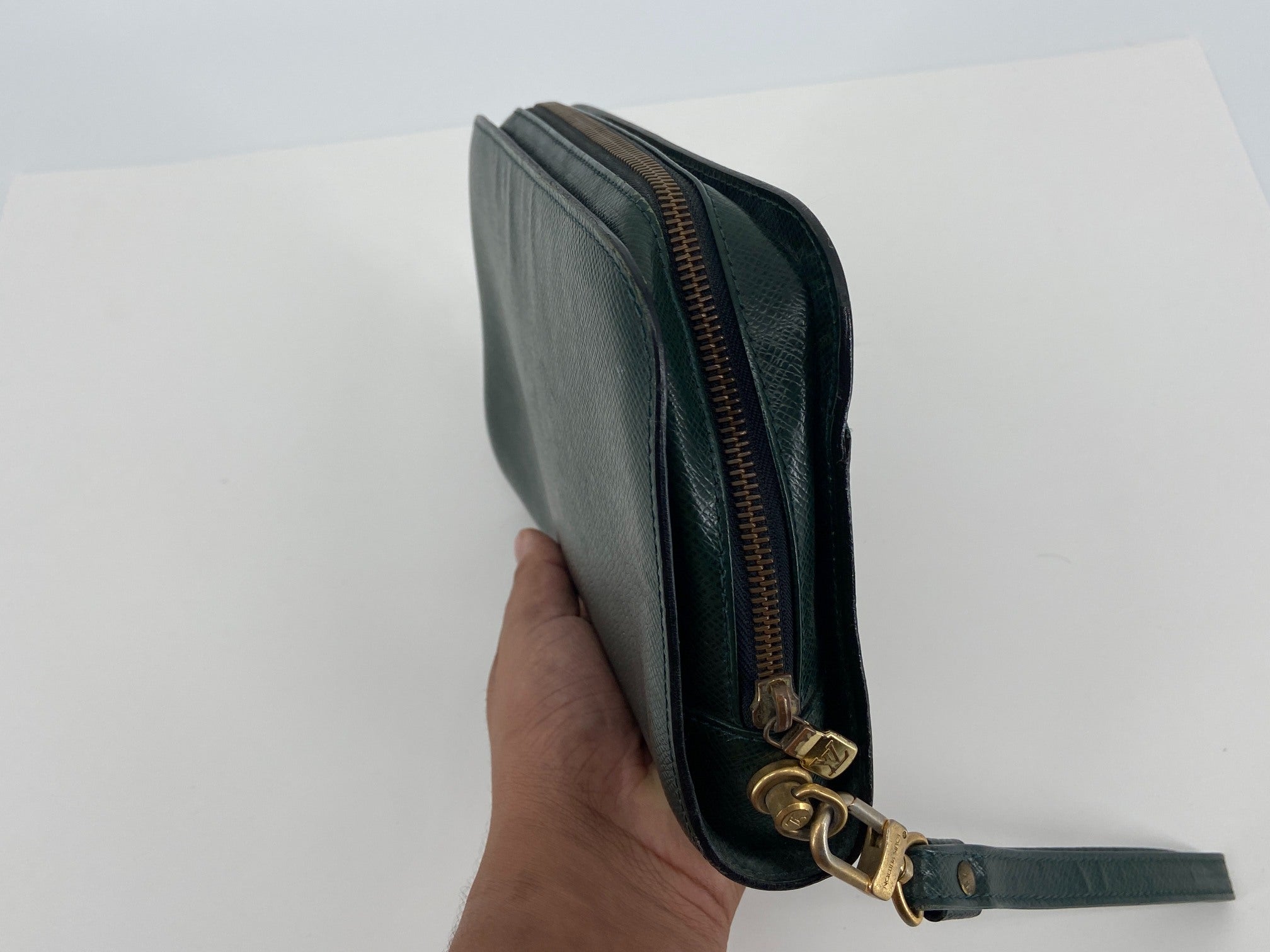 Louis Vuitton Baikal Clutch Epicea Green Taiga Leather