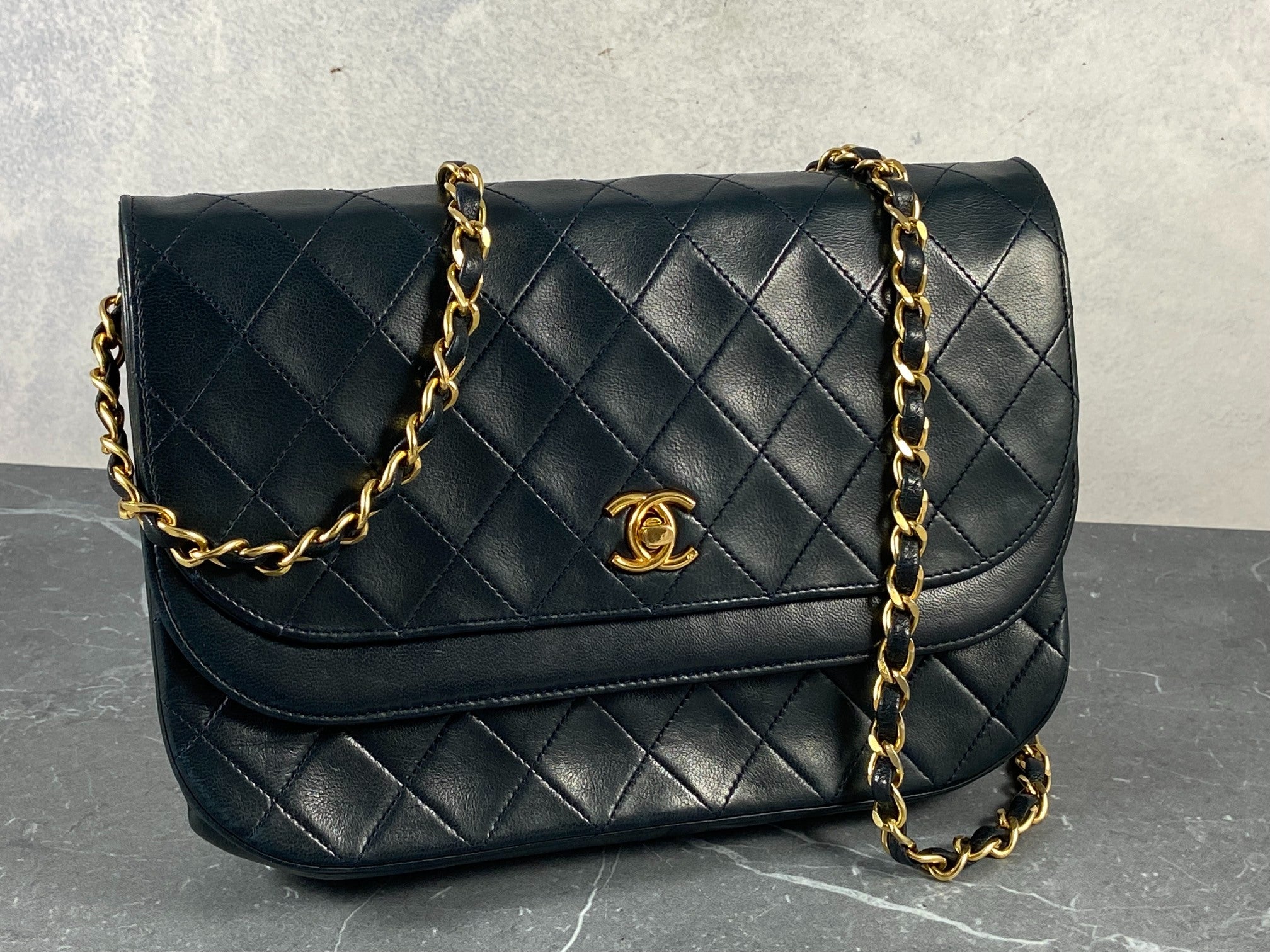 Chanel Matelasse Half-Moon Round Double Flap Bag