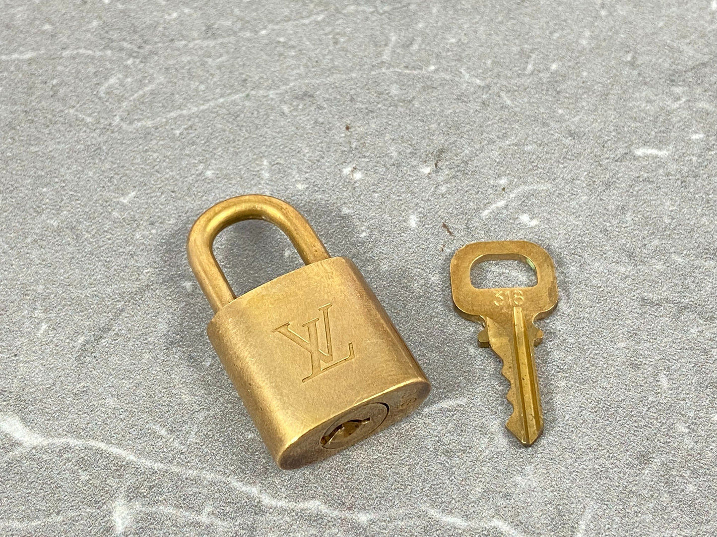 Louis Vuitton Lock Gold Tone No. 318